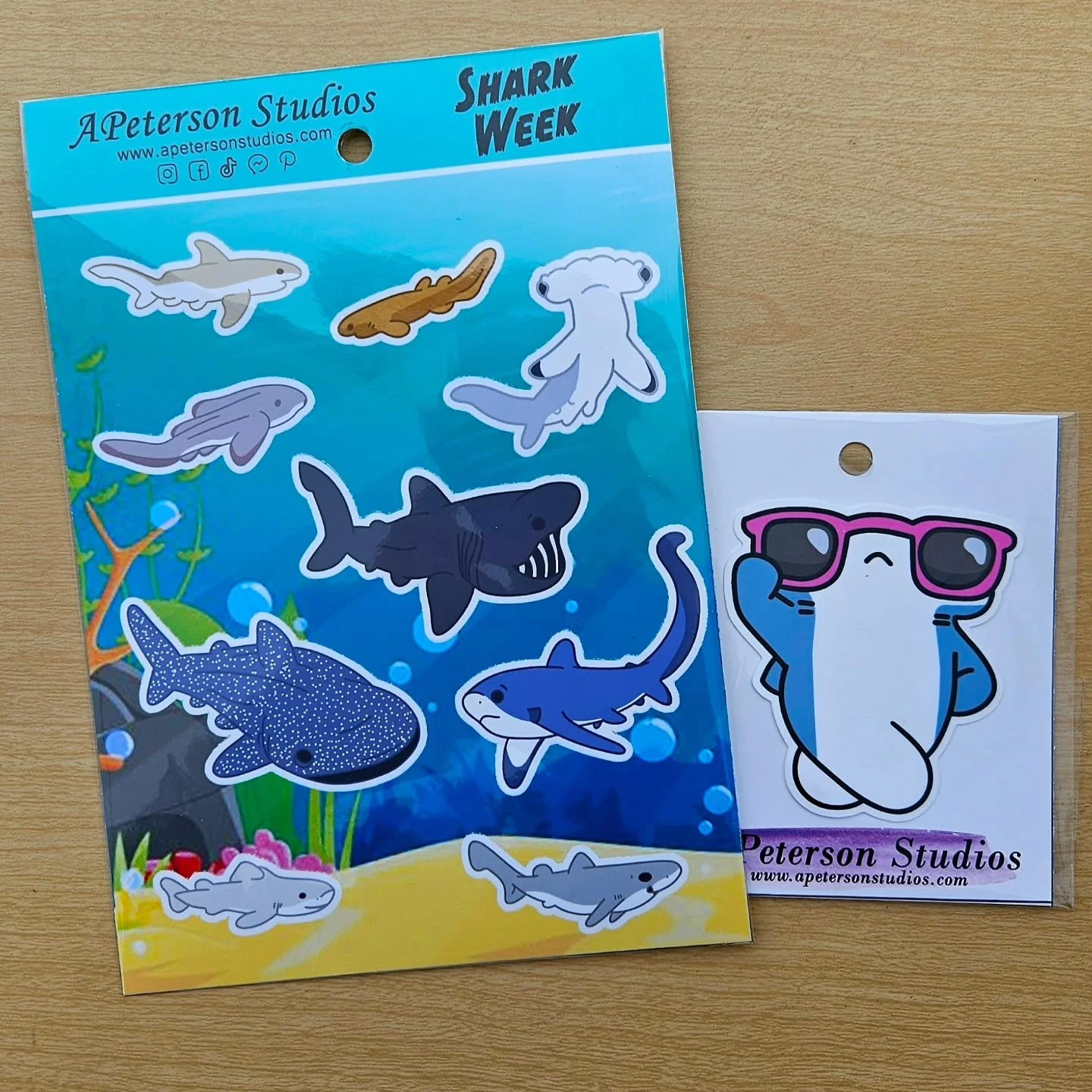 Celebrate Shark Week with us by getting your shark on with our Diva Shark and Sharkie Friends. Available in both stickers and keychains. Shop our website at www.apetersonstudios.com or send us a message to place your order. 
#sharkweek #sharks #shar