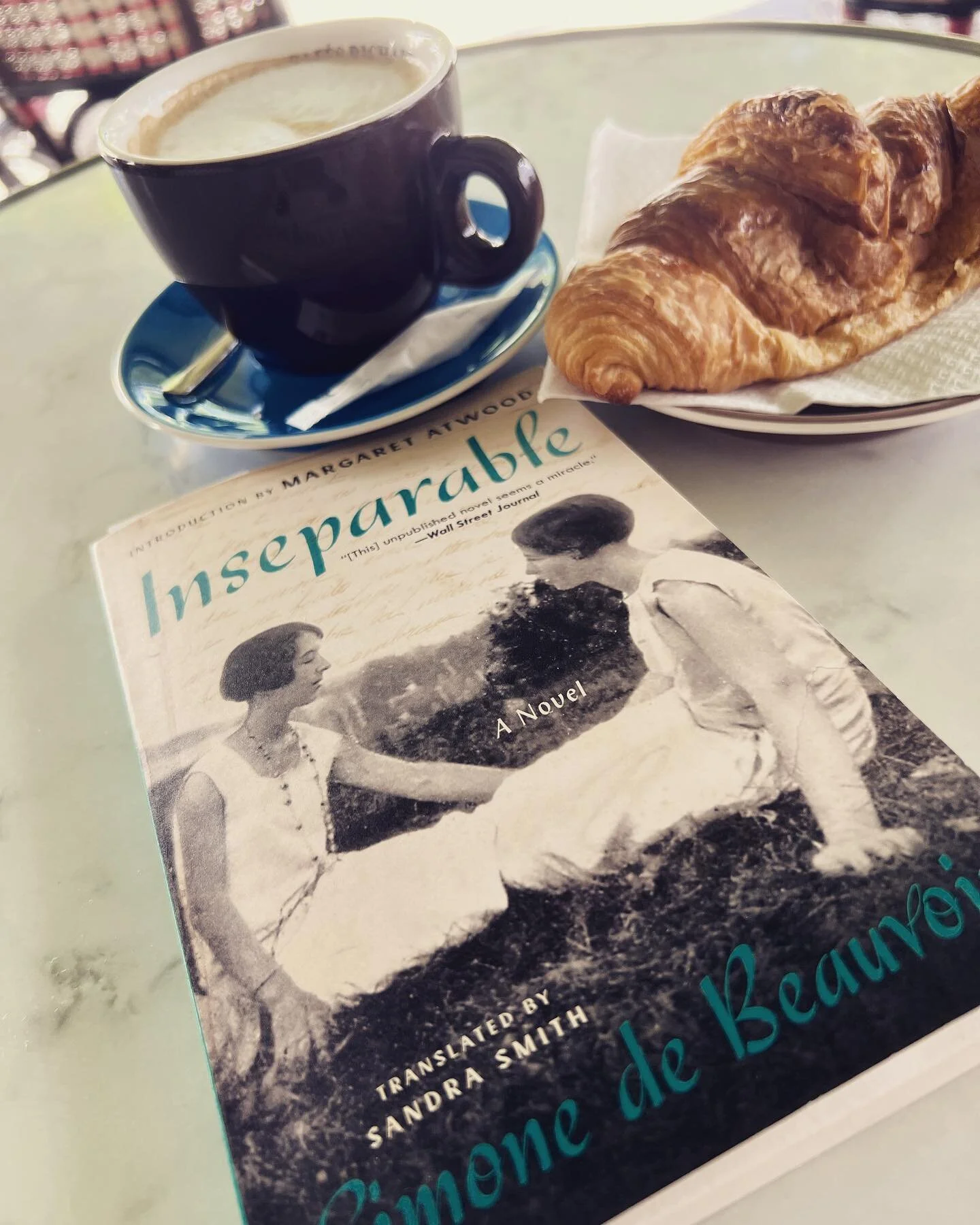 My happiest of happy places! #reading at a cafe and drinking endless coffees! #simonedebeauvoir un published novel, brought to print in 2020. So good! So tender! #booksofinstagram thanks to @slbfiction for the book recco!