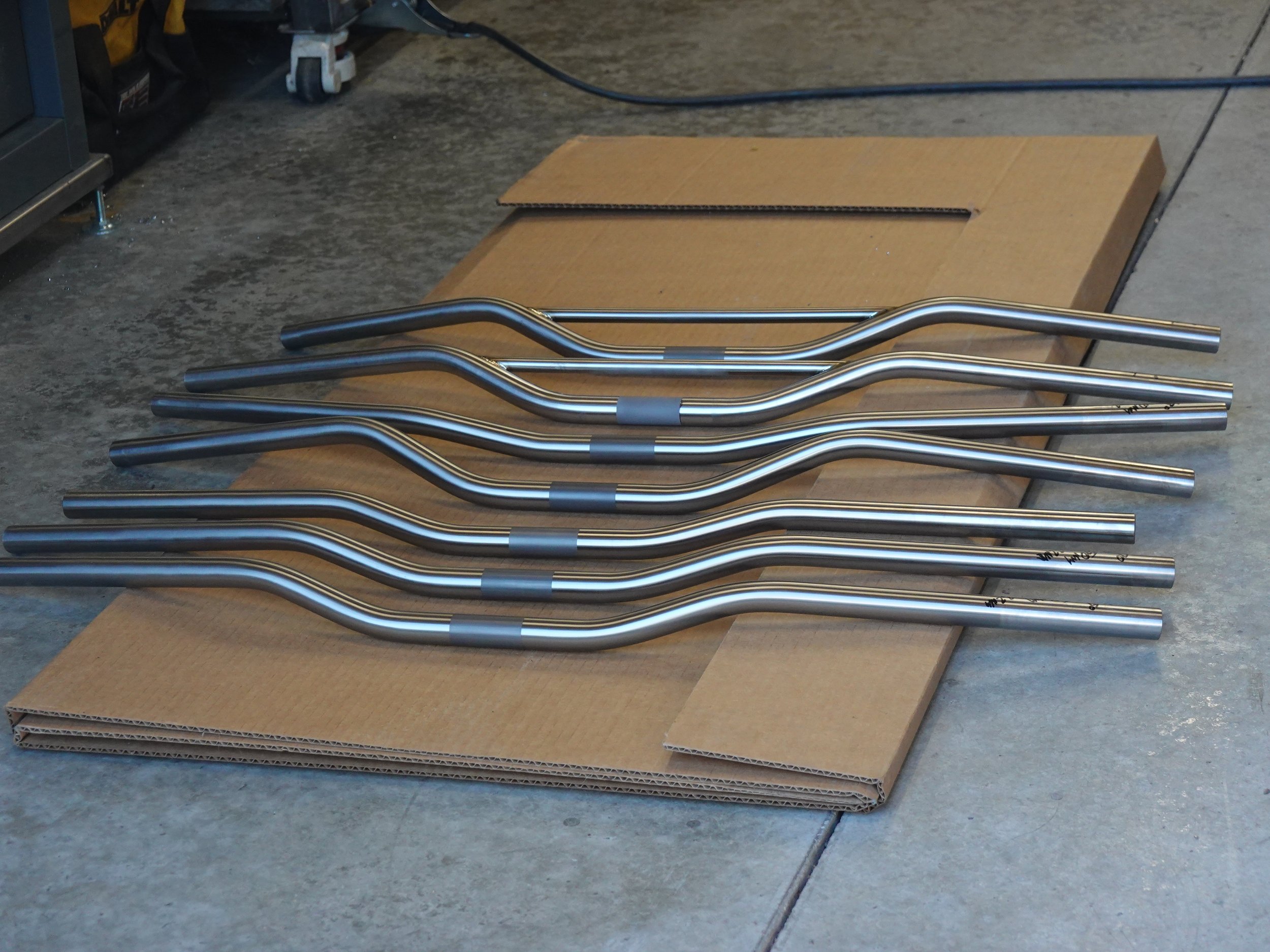 Titanium one-piece handlebars