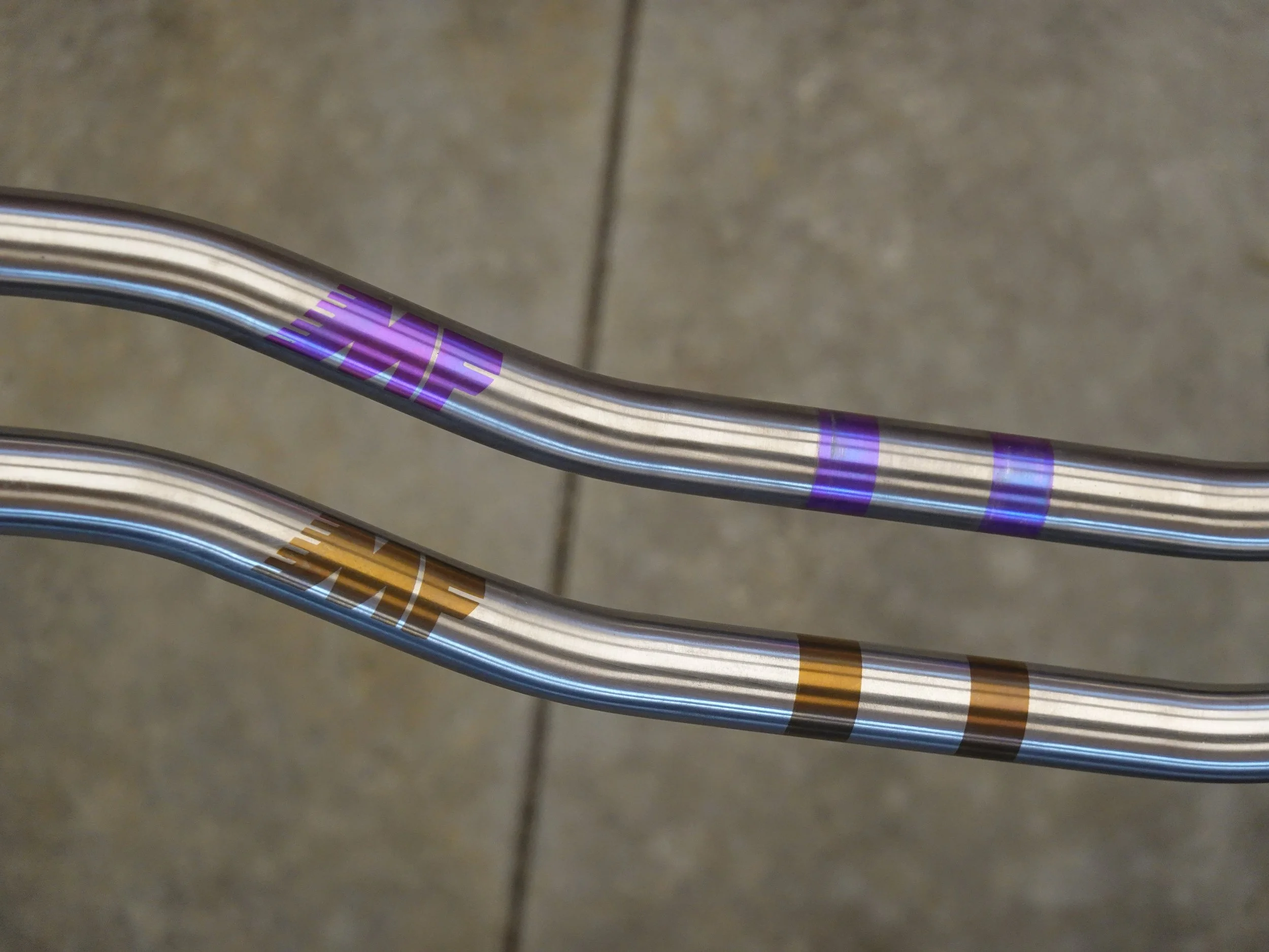 Titanium one-piece handlebars