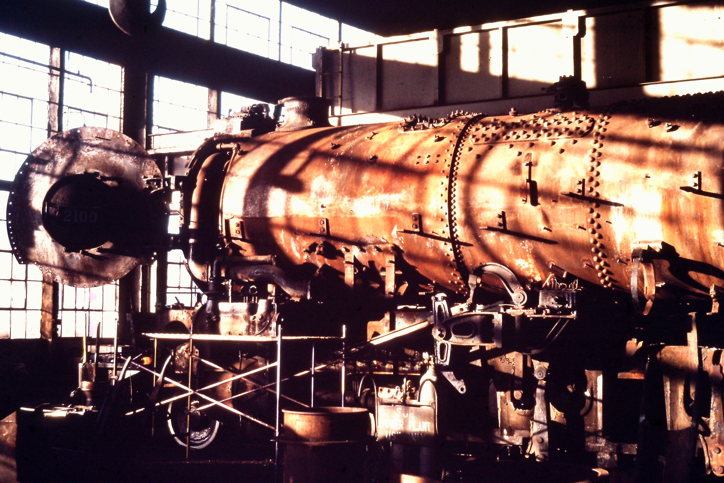 No. 2100 fully stripped for rebuilding in the former Western Maryland roundhouse in Hagerstown, Md.. — Unknown date, Gary Bensman photo.