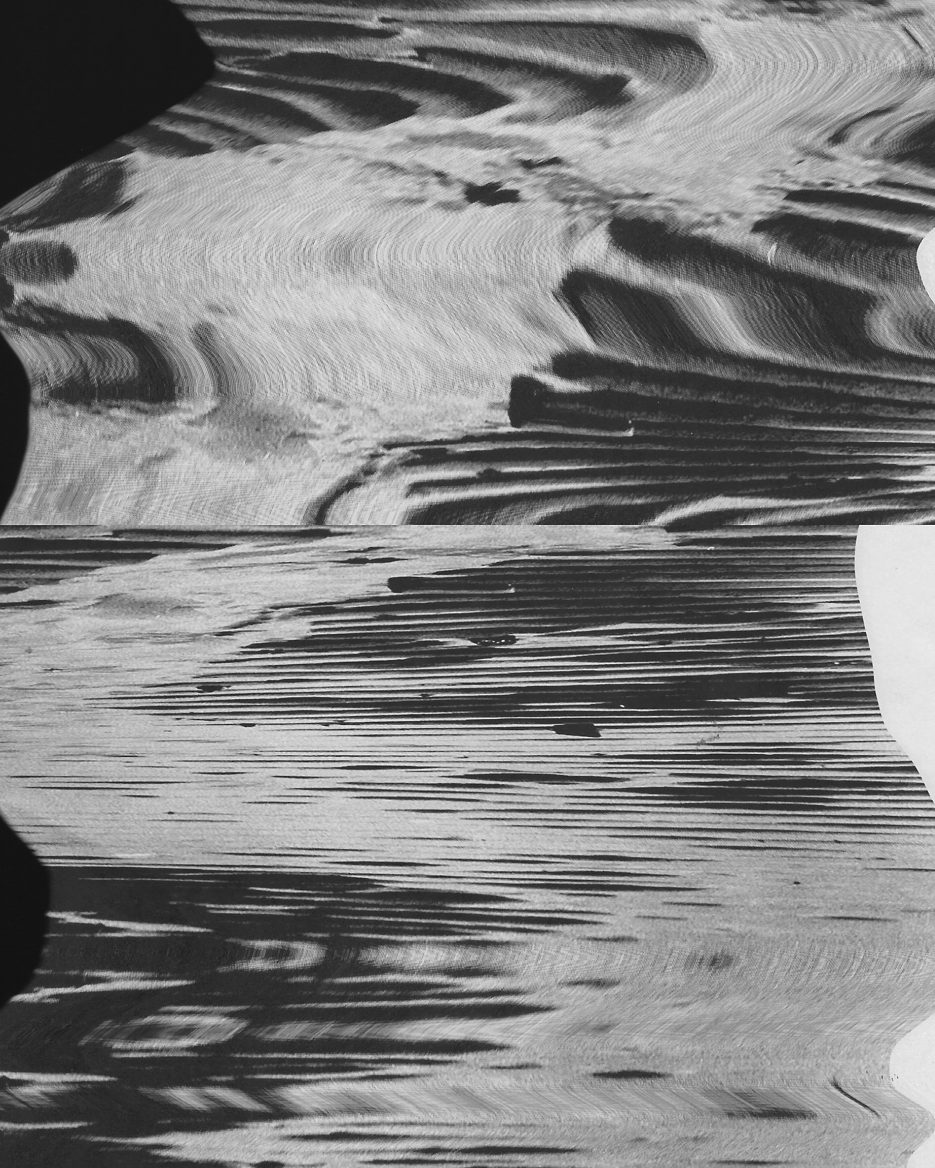 Black and white abstract image of textured lines and patterns.