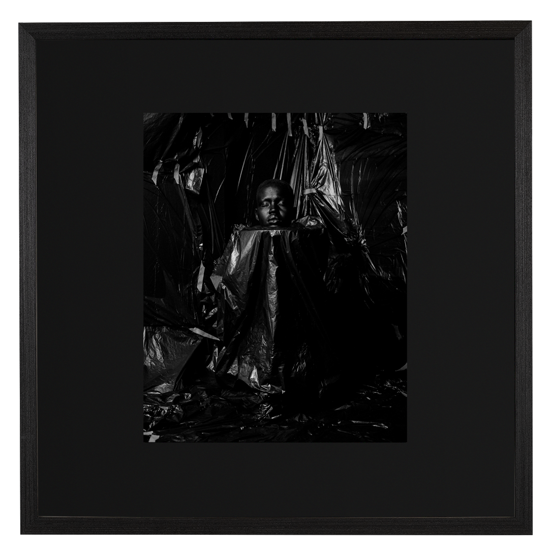 Framed black and white photographic portrait