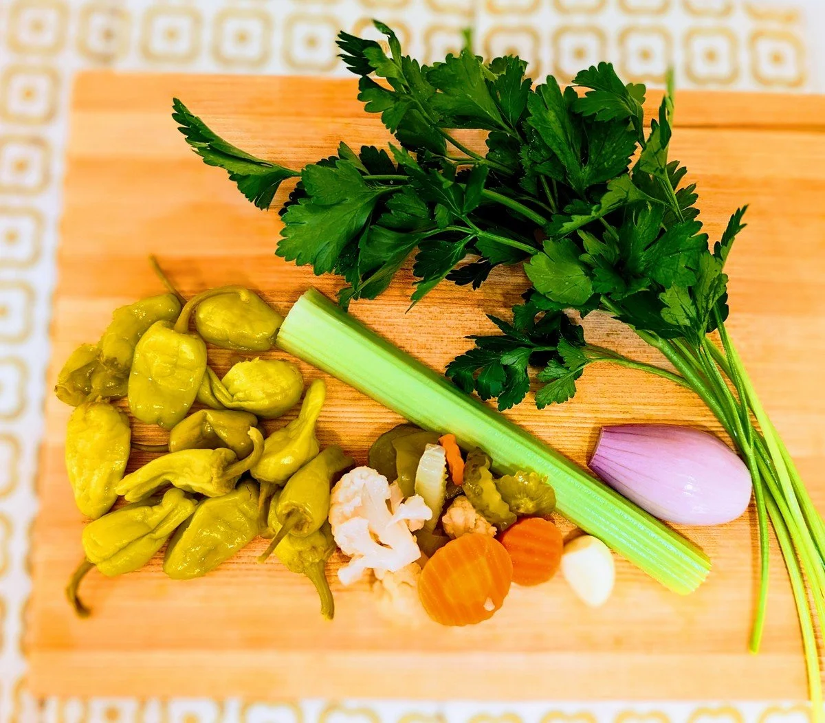 Ingredients to make homemade olive salad for a muffuletta sandwich
