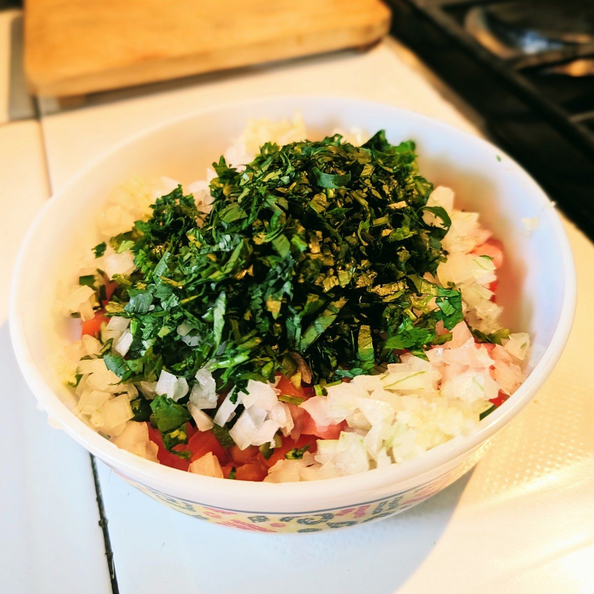 Adding chopped cilantro