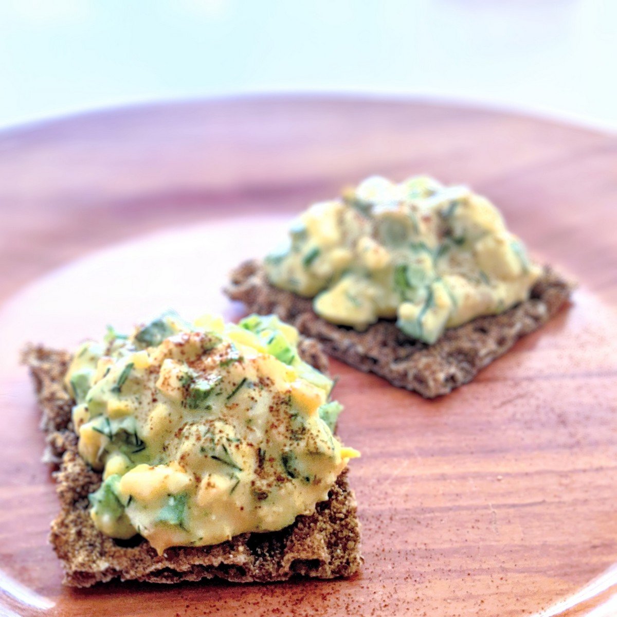 Simple healthy egg salad with yogurt instead of mayo on crackers