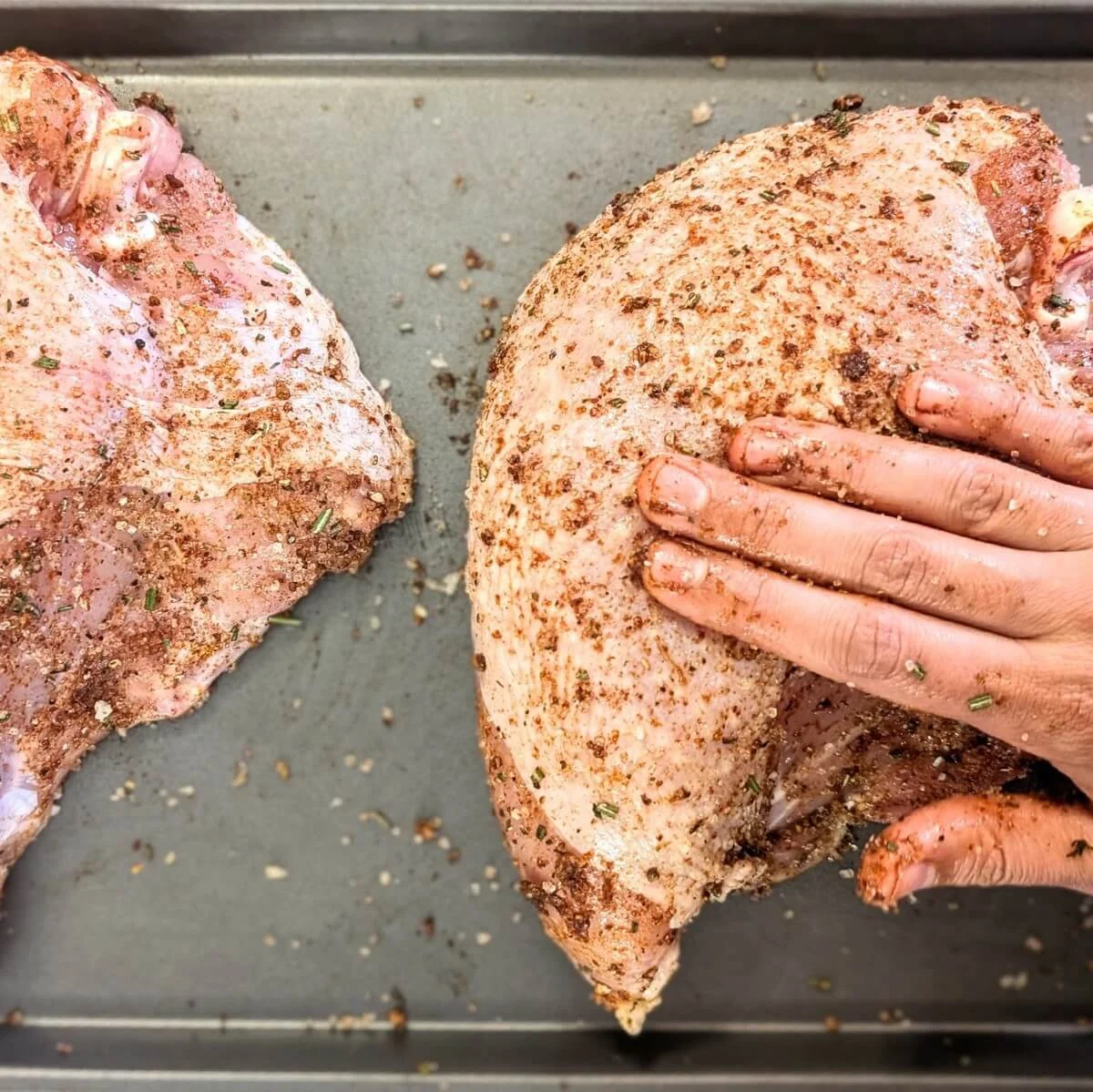 Rubbing dry brine into bone-in turkey breast for Thanksgiving
