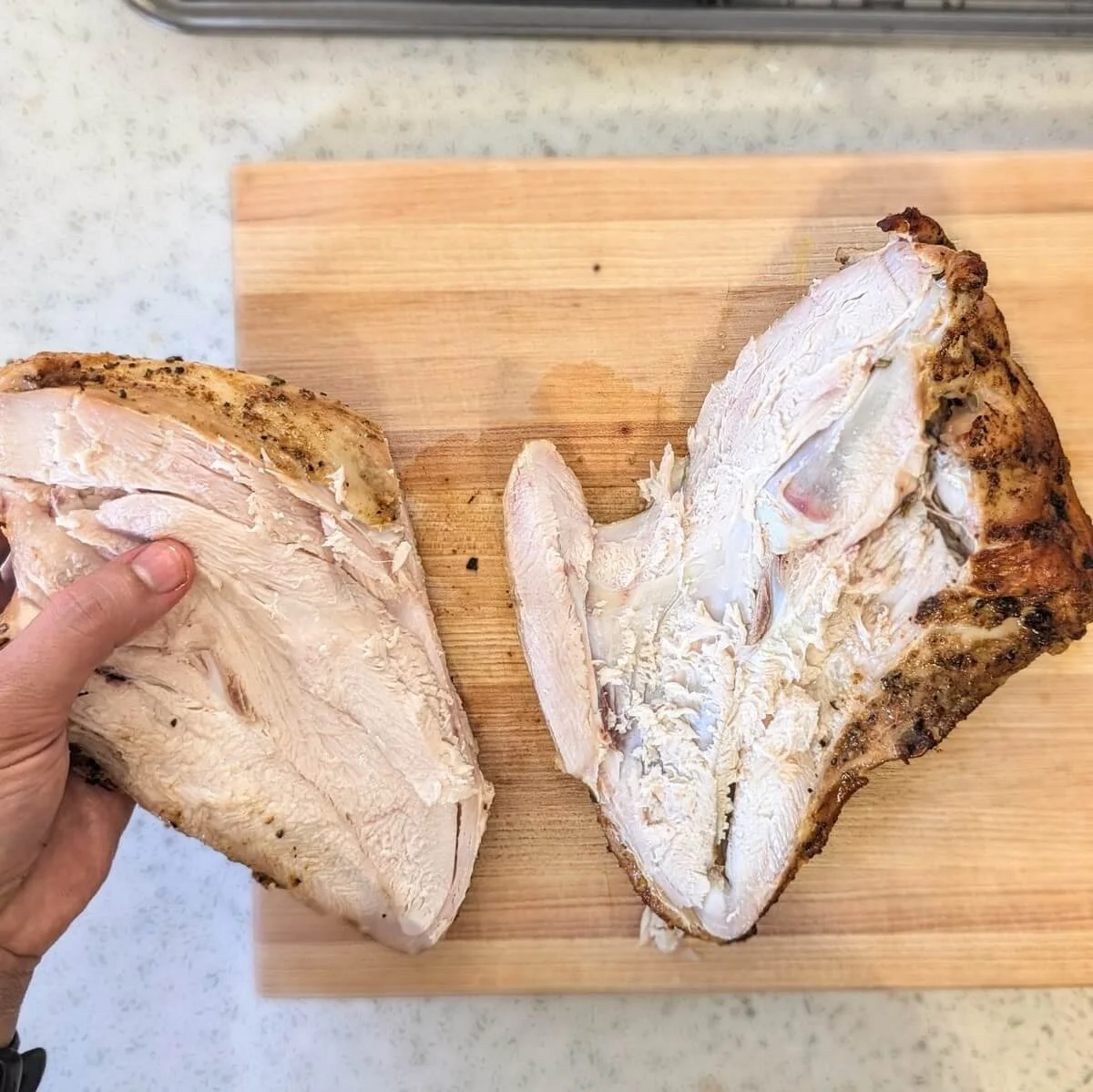 Fully separated turkey breast removed from the bone for Thanksgiving dinner