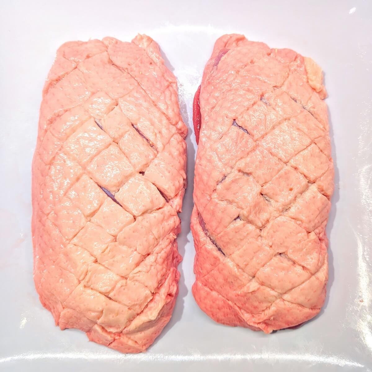 Cross hatched duck breast skin ready for pan seared duck breast recipe