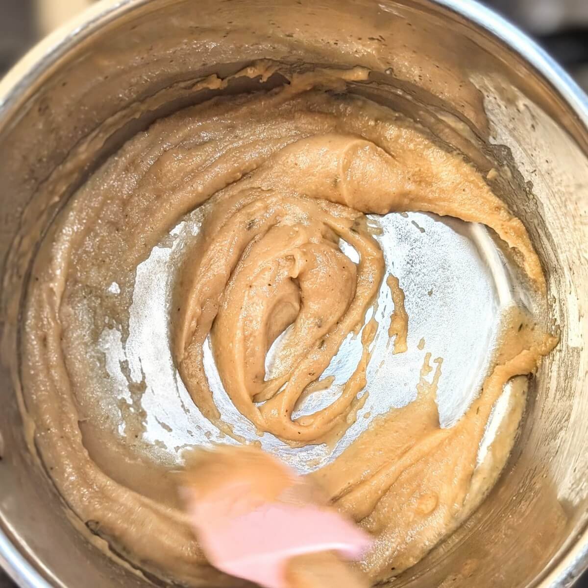 Deep brown roux in a saucepan, ready to build Espagnole mother sauce