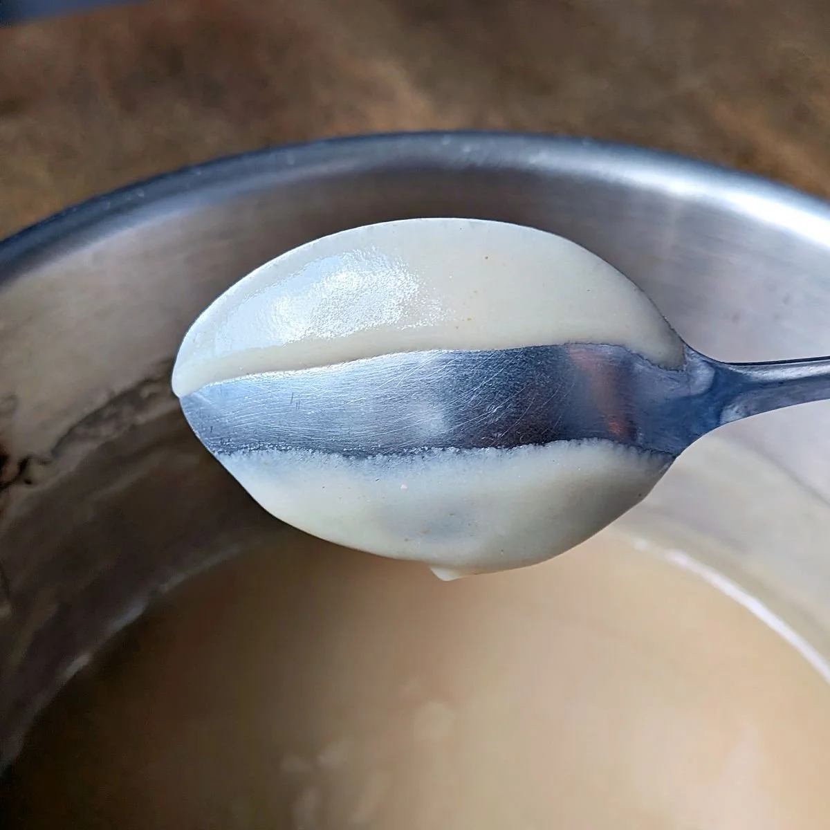 Streak through velouté sauce on the back of a spoon to check for nappé consistency