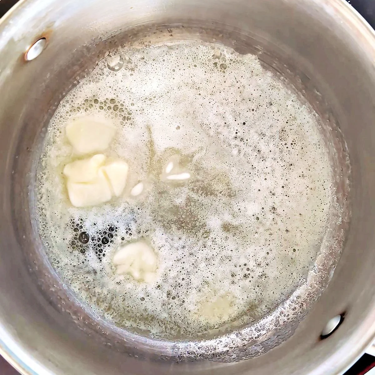 Butter melting in a saucepan for mushroom gravy
