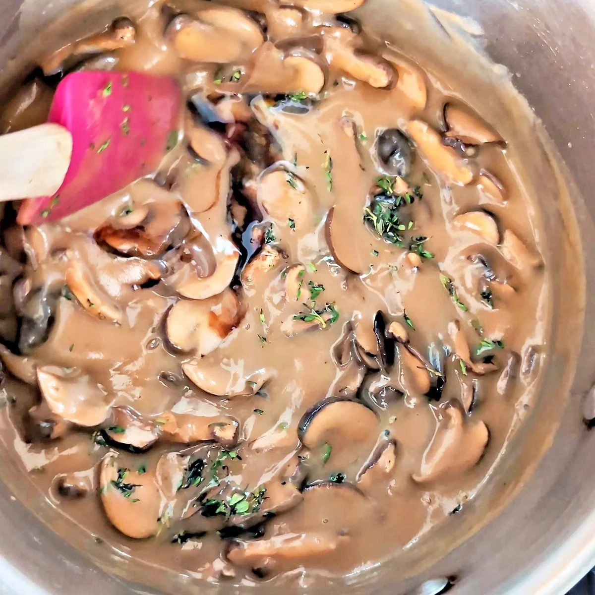 Finished vegetarian mushroom gravy with thyme stirred in