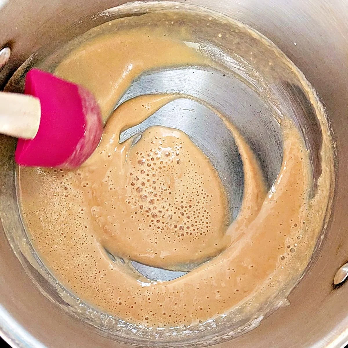 Blond roux cooking until lightly browned