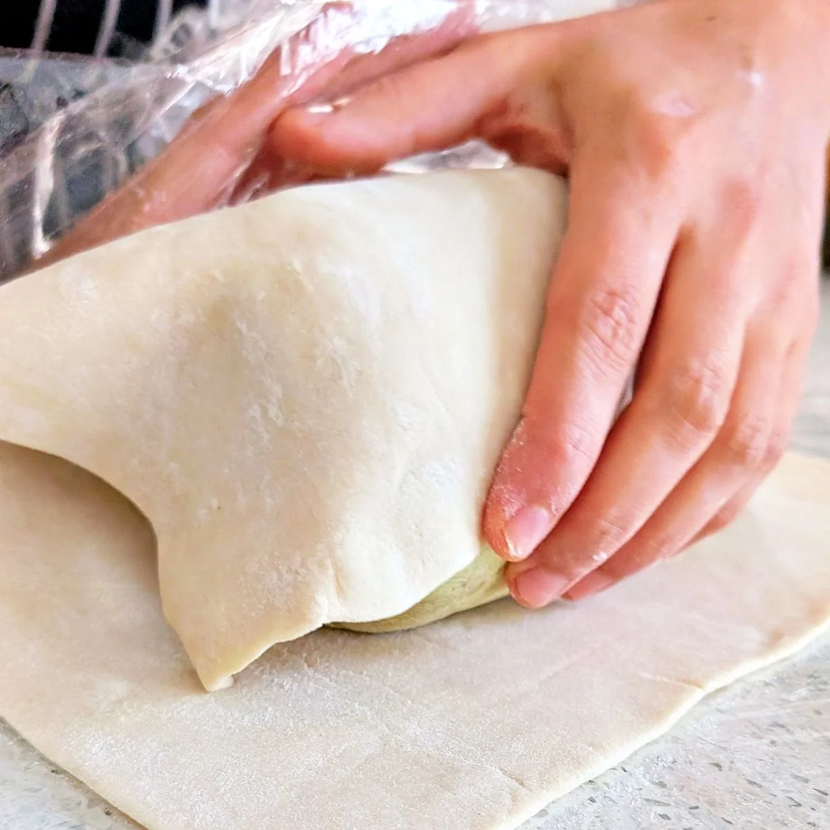 Puff pastry wrapped snugly around the beef Wellington