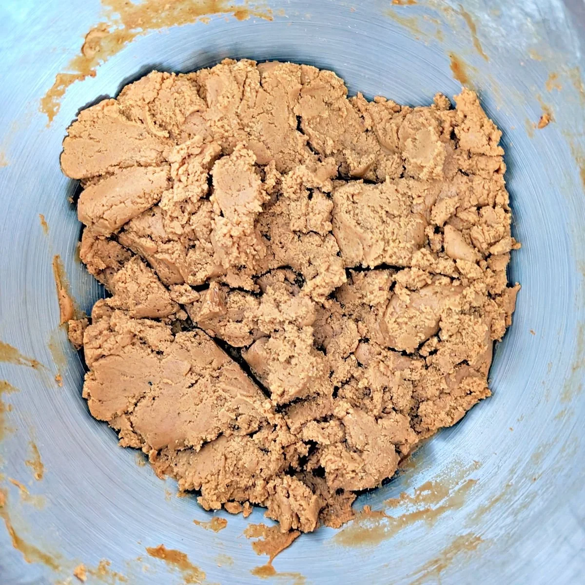 Clumpy gingerbread dough after mixing in the flour