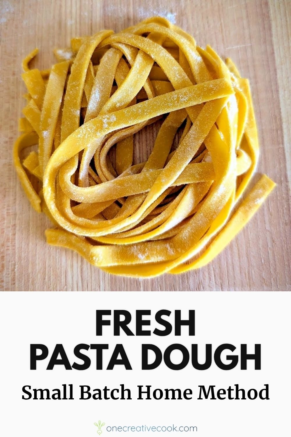 A nest of fresh pasta on a wooden cutting board lightly dusted with flour