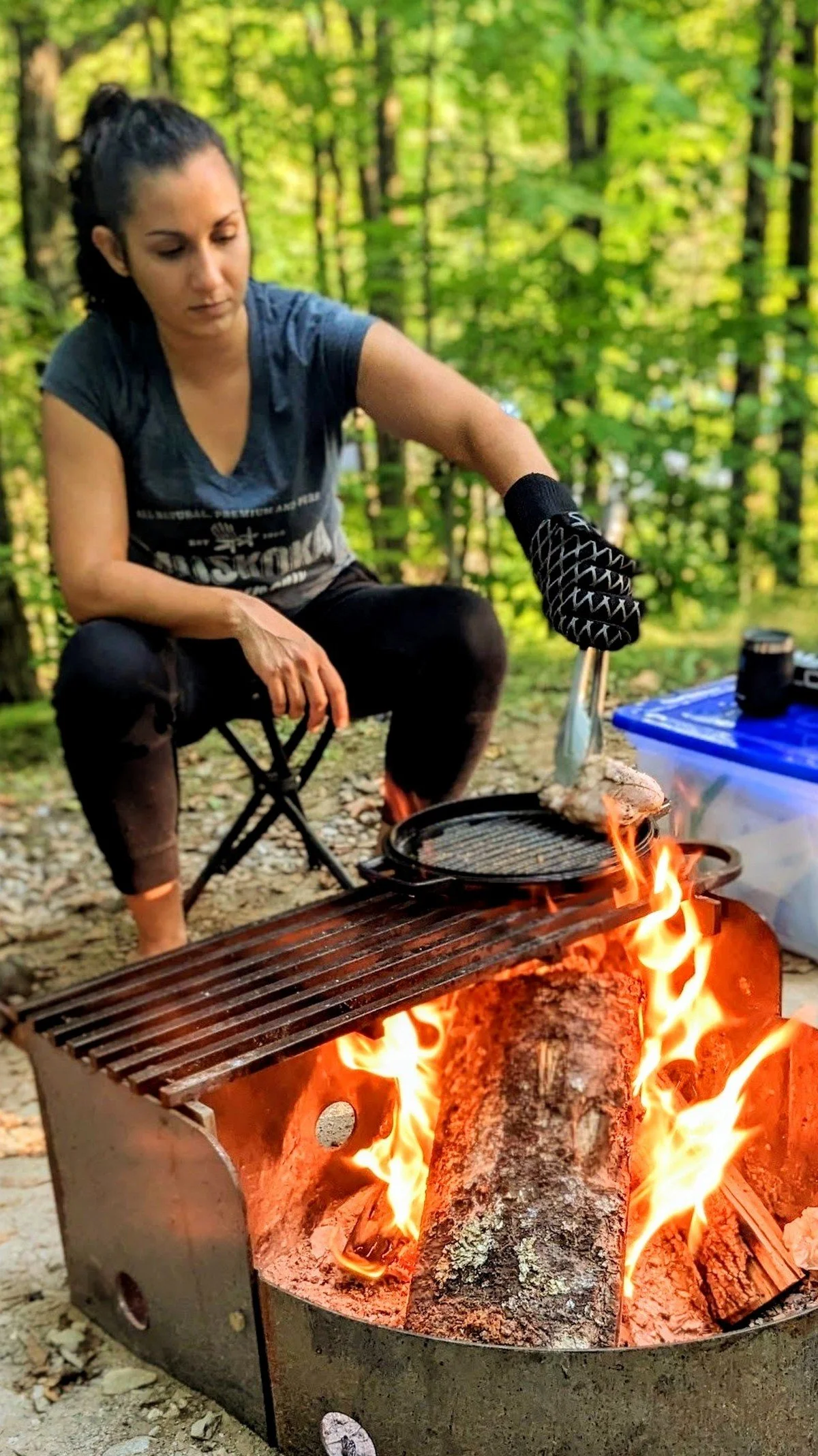 Reem Tiltman cooking duck breast over a campfire