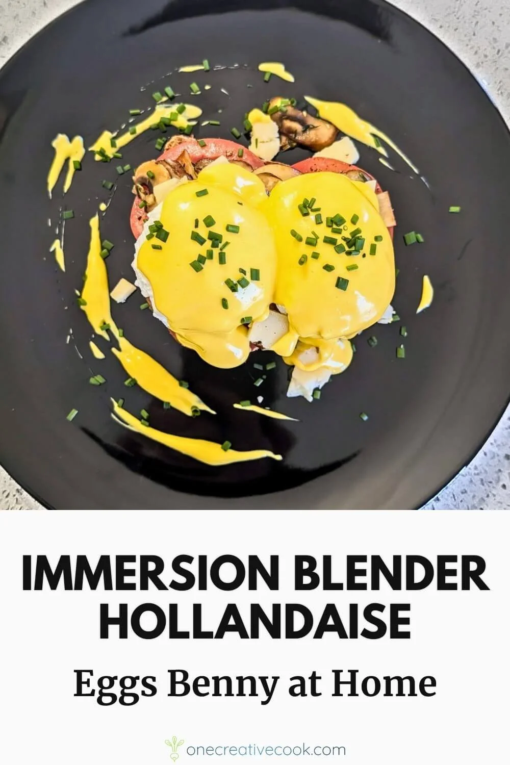 Immersion blender hollandaise draped over eggs benedict on a black plate