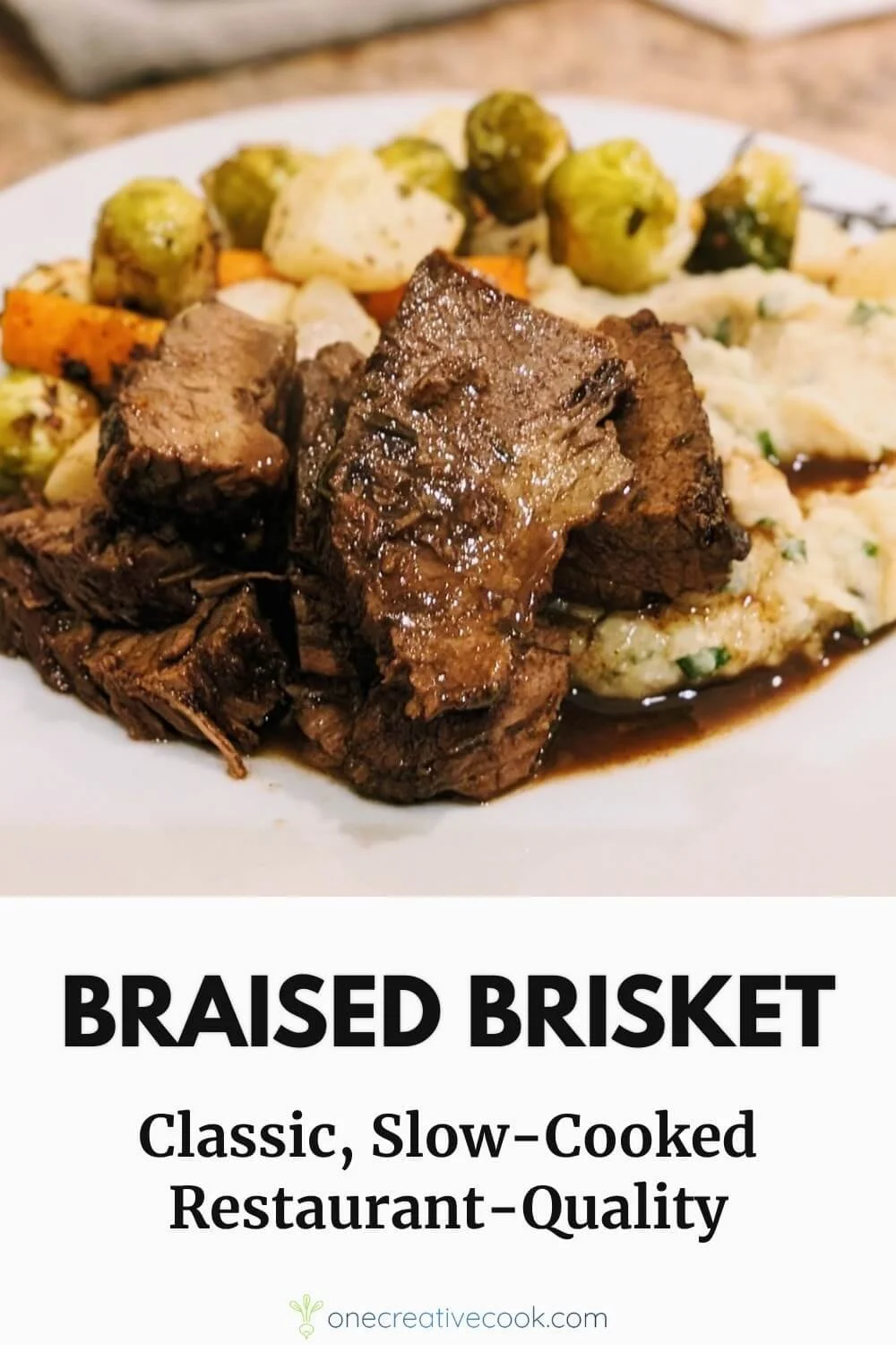 Red wine-braised beef brisket slices on a bed of mashed cauliflower, with vegetables, and jus