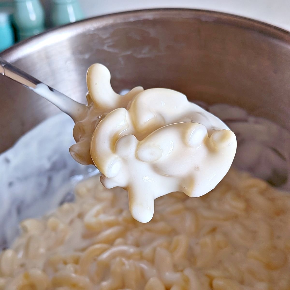 Creamy homemade mornay sauce coating elbow macaroni