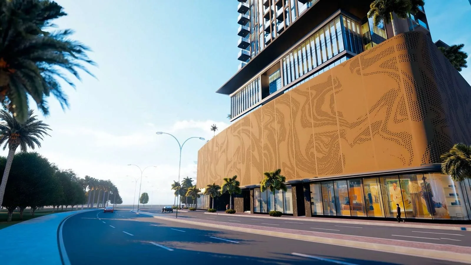 Modern multi-story building with large glass windows and a decorative orange facade, lined with palm trees along a wide street on a sunny day.
