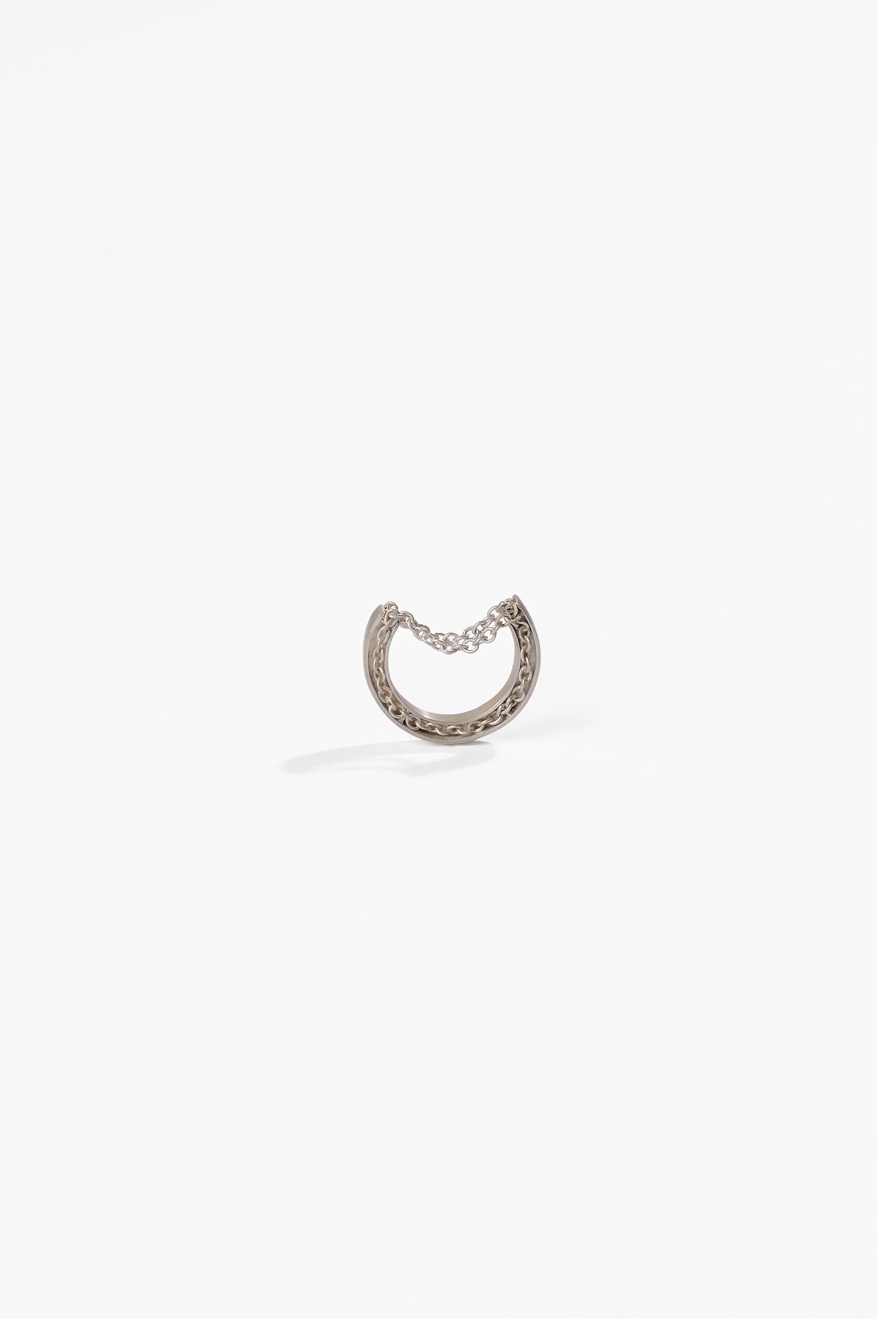 Katie Collins, Come what may, sterling silver, 2.5 x 4.4cm approx. size P, 2025. Photography: Ross Coulter.