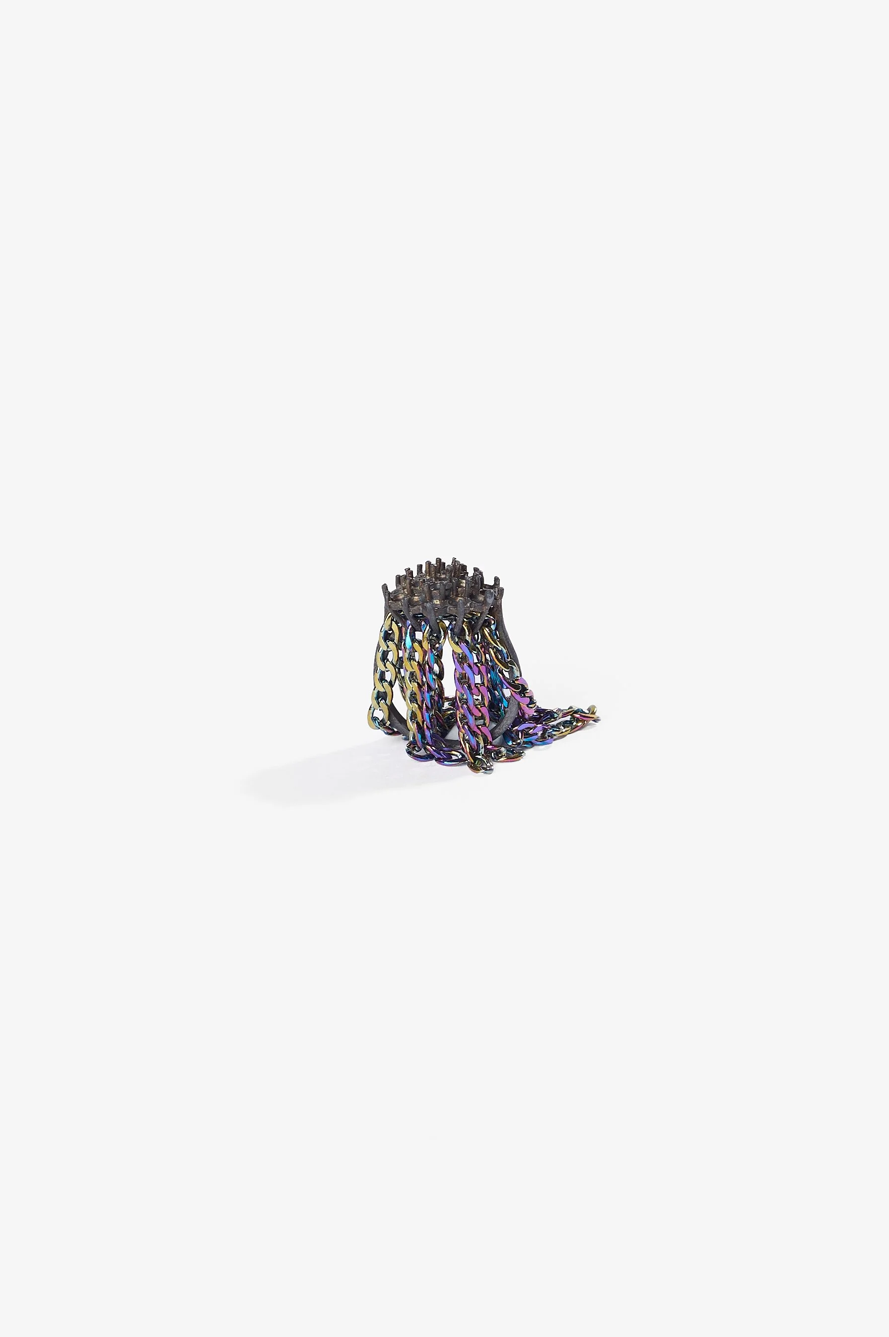Debris Facility, Capsule Collapsing, oxidised silver, surgical stainless steel, aluminium, 3D printed nylon, anodised stainless steel, printed acetate, mirror frame, acrylic display, acrylic paint, iridescent pigment, 2026. Metal rings $365 each. Pho