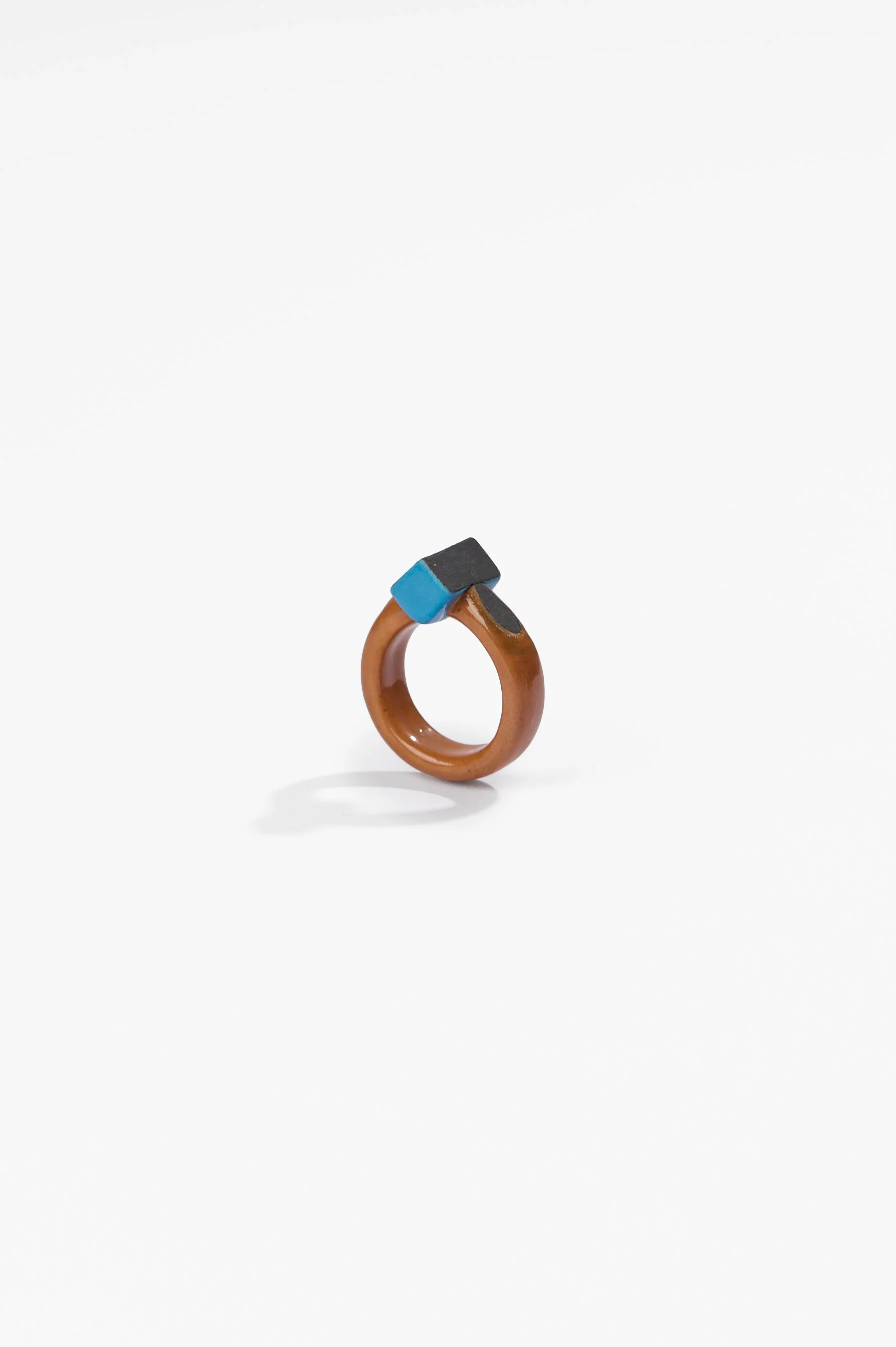 Manon van Kouswijk, Rings for Found Hands (blue and brown), porcelain, dimensions vary per ring, 2026, $590 each. Photography: Ross Coulter