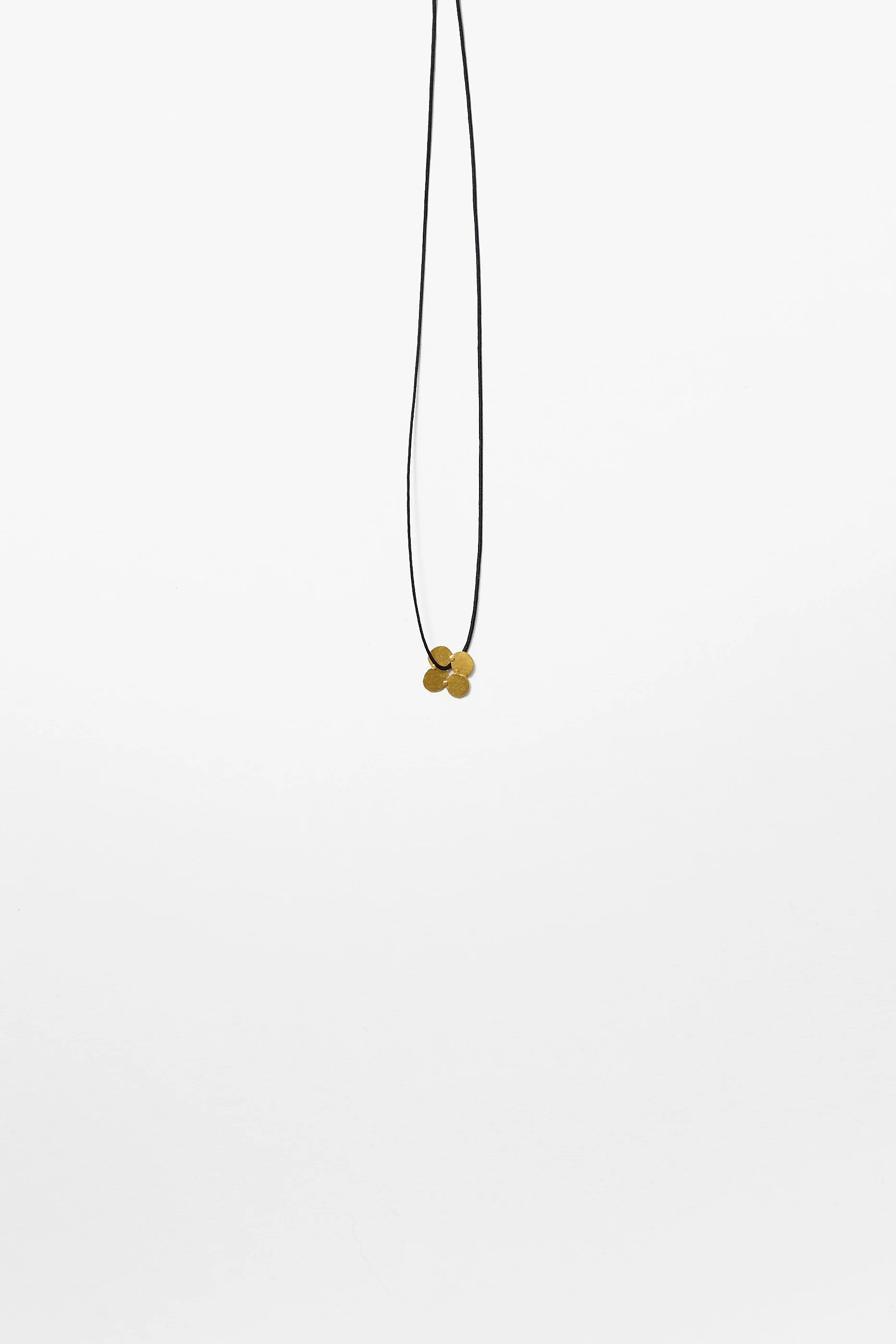 23. Mascha Moje, ‘Squishes’, (gold), 2023
Fine gold, 1×1×.2cm, 40cm cord. Price: $600
(Price subject to change)