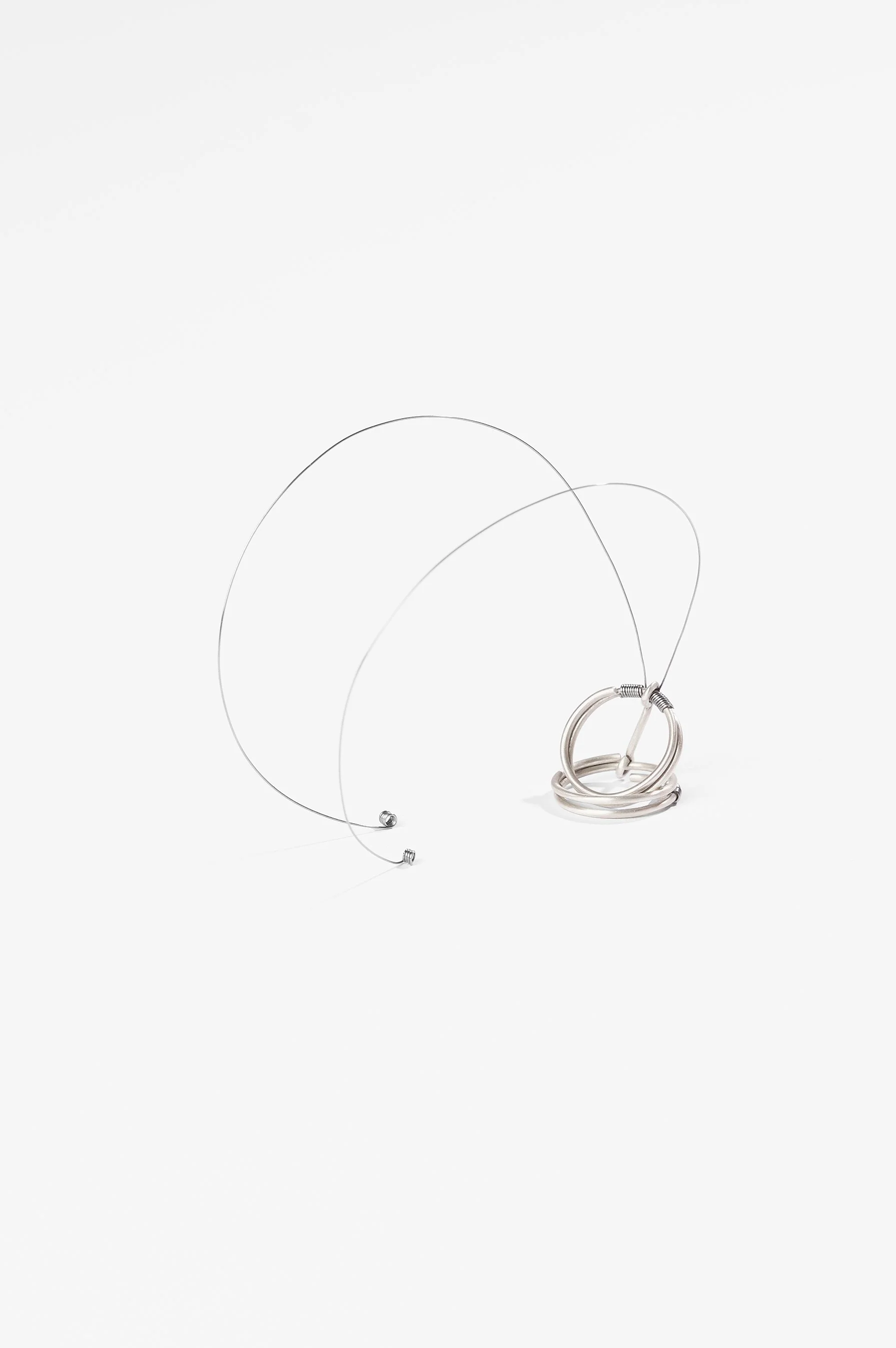Nadia Cao-Alahananthan, Ơi (Uh-ee) Ring,  sterling silver wire, binding wire, 10 x 1.9 x 6cm, 2026, $190 each. Photography: Ross Coulter