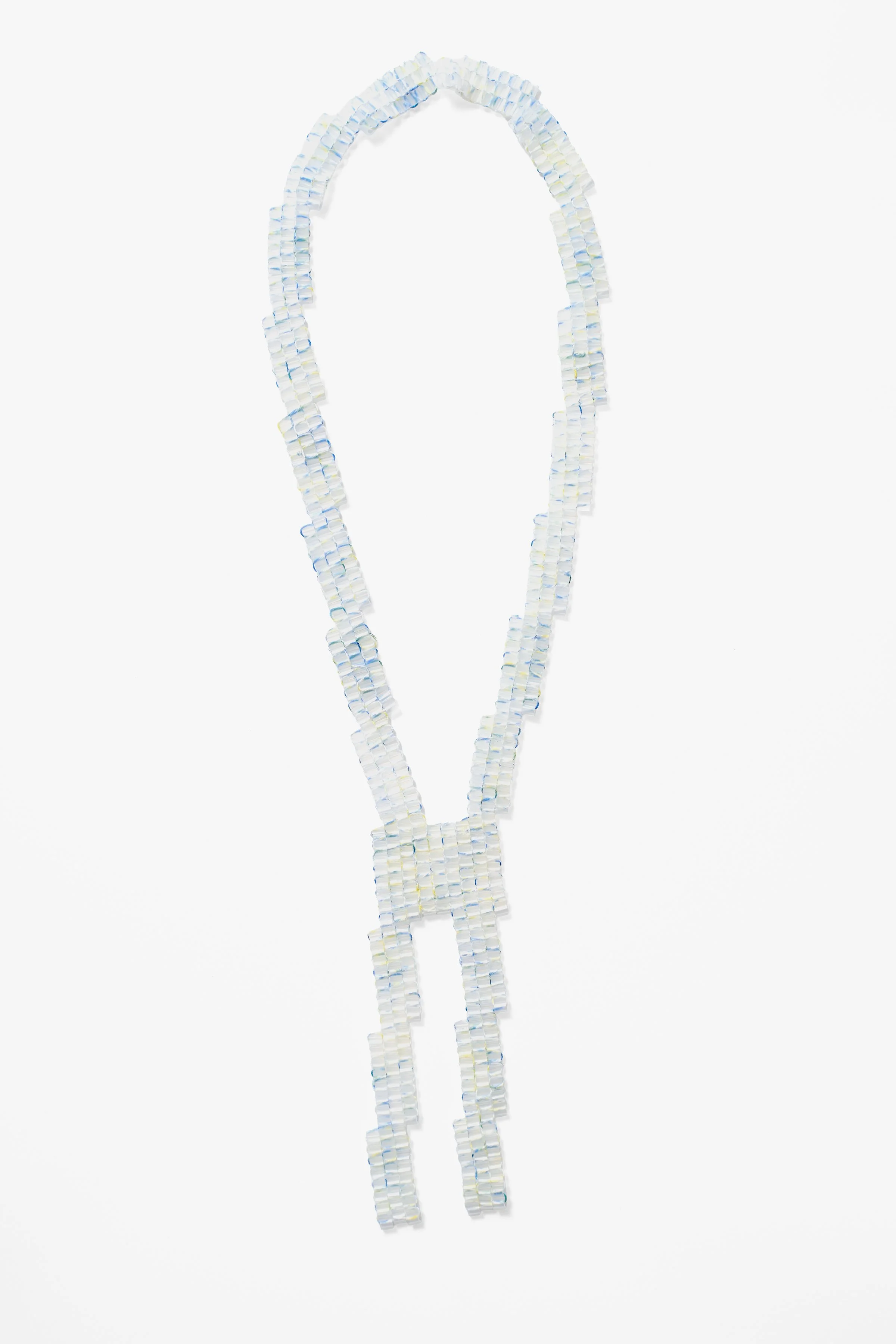 58. Eli Gianinni, ‘Speckle Series #2 Zig-Zag Pendant’, 2026, plastic beads and cotton thread, necklace 32cm, pendant 16x4.5x.3cm. Price: $350