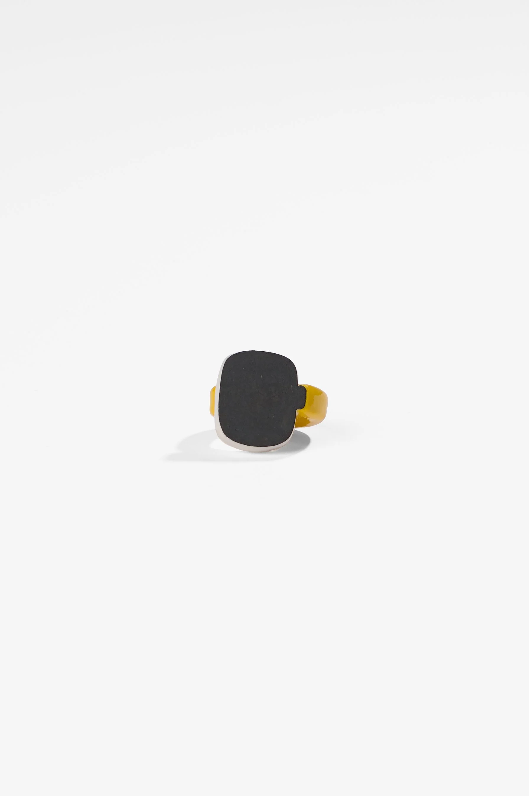 Manon van Kouswijk, Rings for Found Hands (yellow, black and white), porcelain, dimensions vary per ring, 2026, $590 each. Photography: Ross Coulter