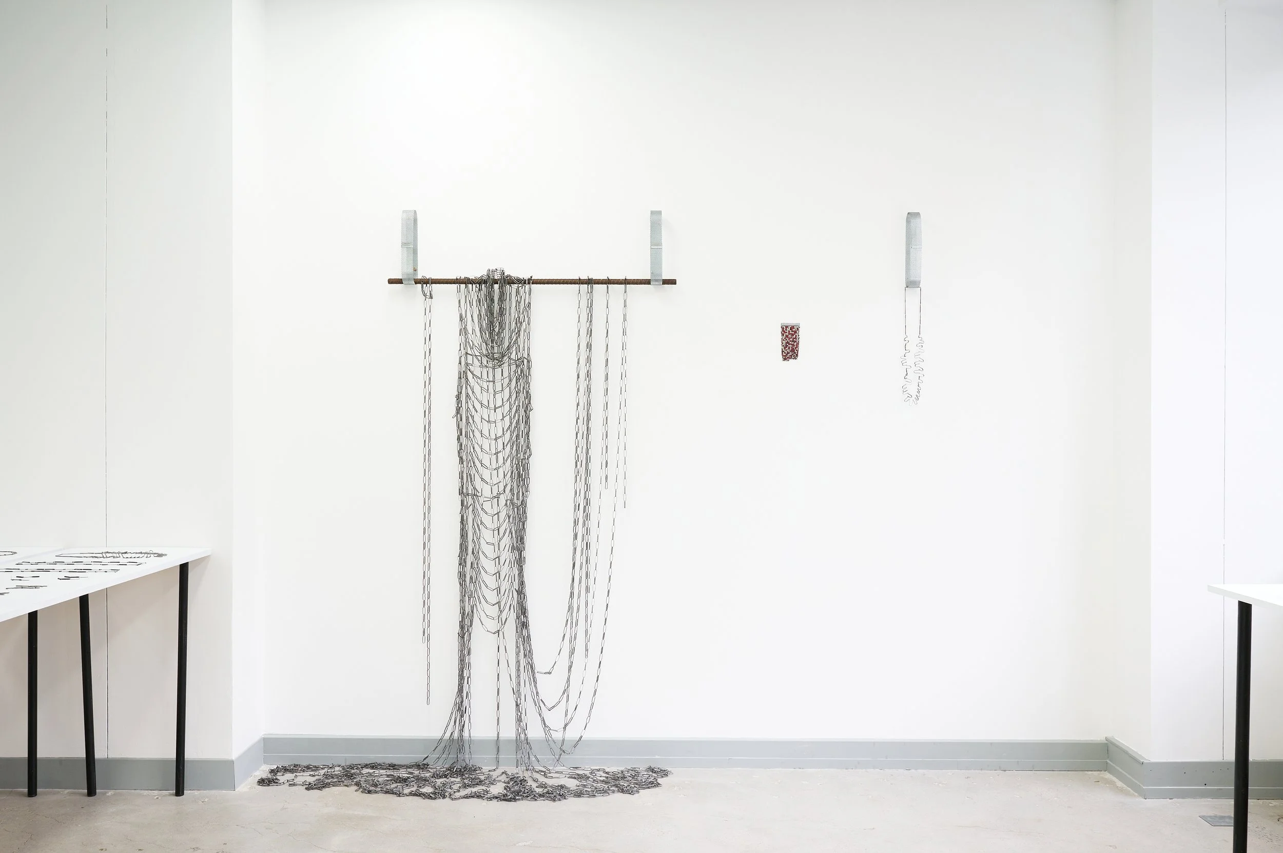 Melissa Cameron, 'Sweeper blade dress', found steel street sweeper blades, 130 x 30 x 5 cm, 2024-2026. $16,500. With dress installation: offcut galvinised steel, salvaged copper wire, steel reinforcement hanger, screw fixings, 70 x 25 x 10 cm, 2026. 