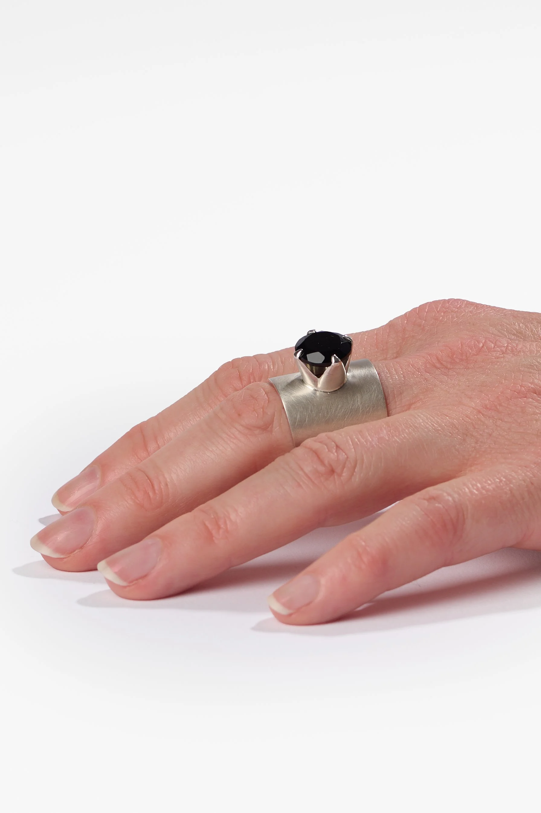 Flynn Parker-Greer, STONE, sterling silver, onyx, size R, 2026, $880. Photography: Ross Coulter