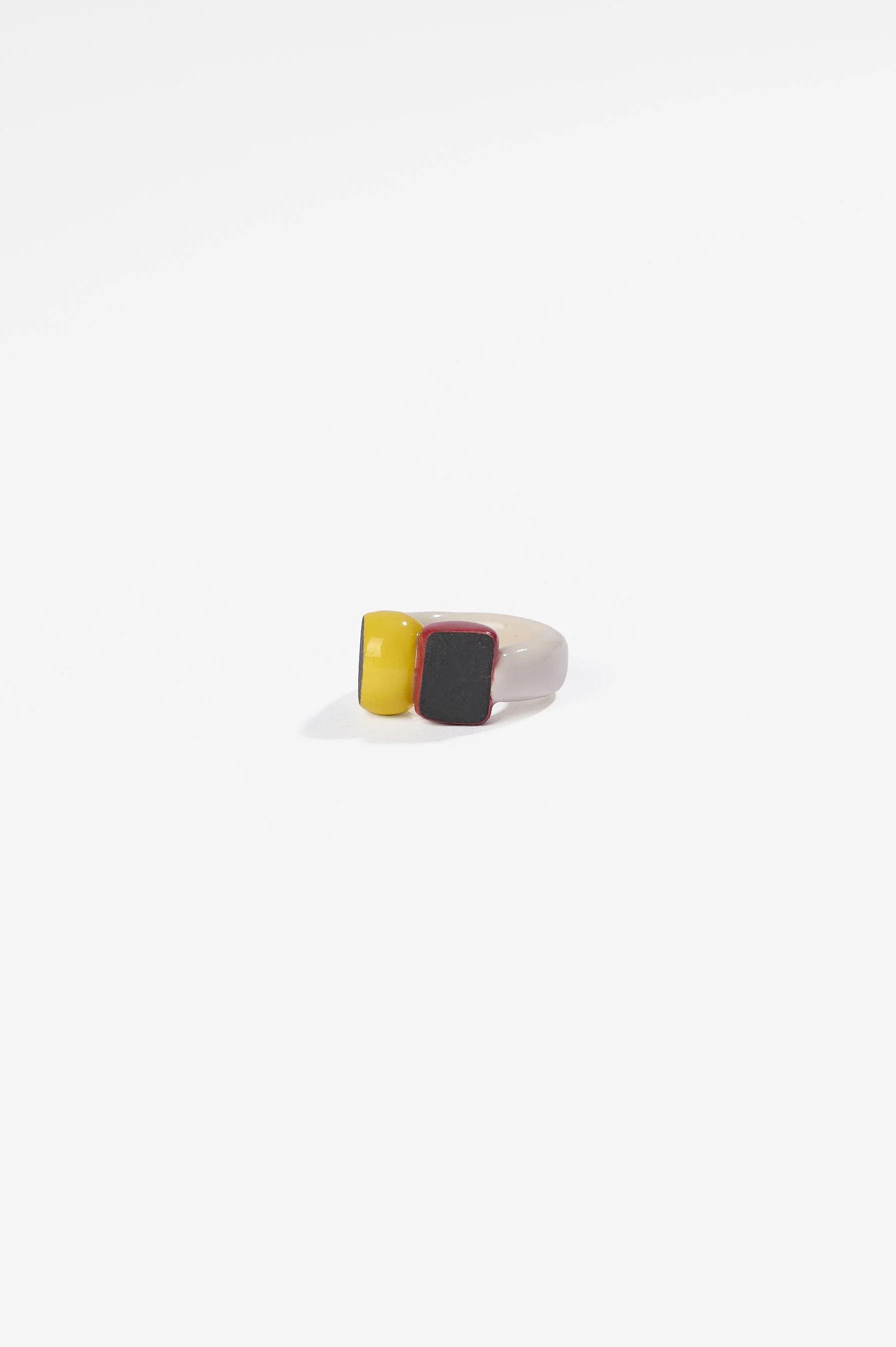 Manon van Kouswijk, Rings for Found Hands (red, yellow, black and white), porcelain, dimensions vary per ring, 2026, $590 each. Photography: Ross Coulter
