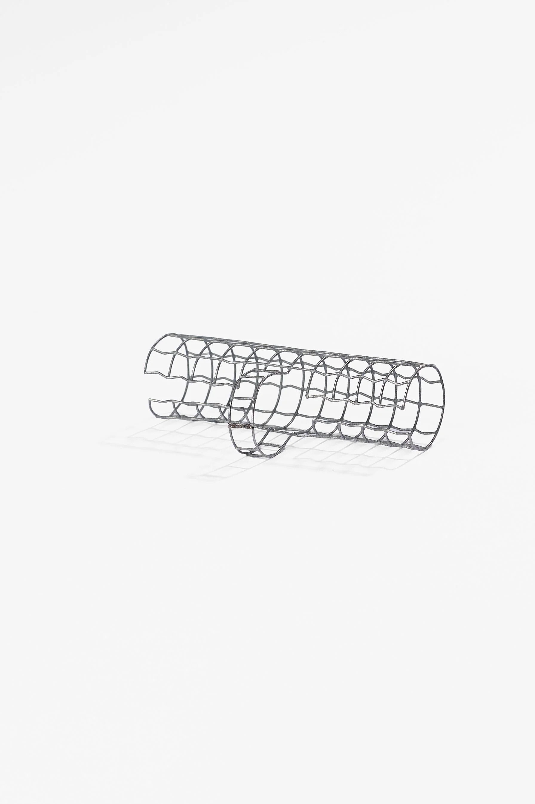 Eli Giannini, Meshin’ Around Rings, #2 Tubo, off-the-shelf mild steel, various dimensions, size: P, Q, O, 2026, $200 each.  Photography: Ross Coulter