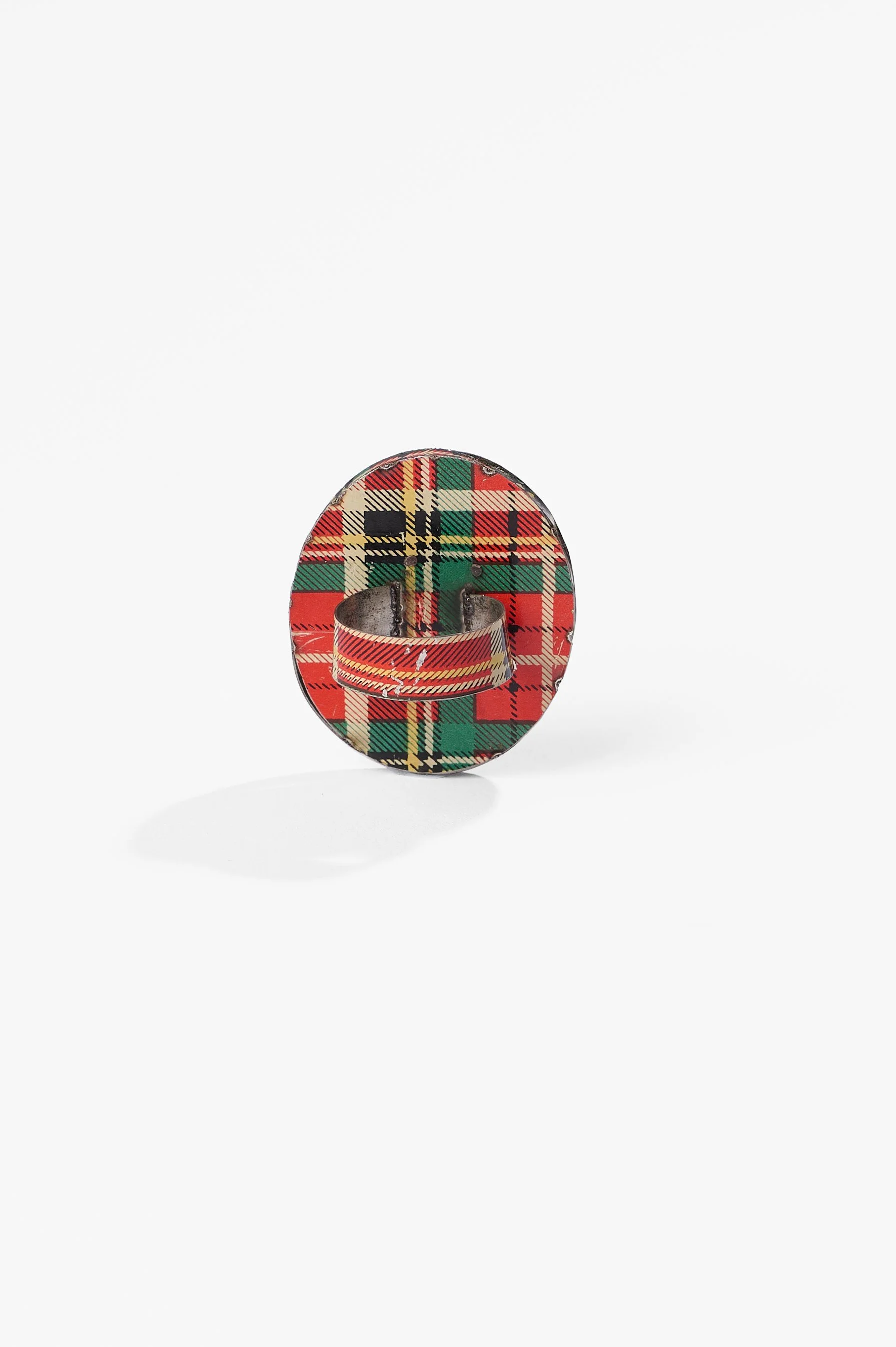 Anna Davern. 'Empire ring (Kola Peninsula)', biscuit tin, tin globe, 40x35x24mm, size 2026. $380. Photography: Ross Coulter