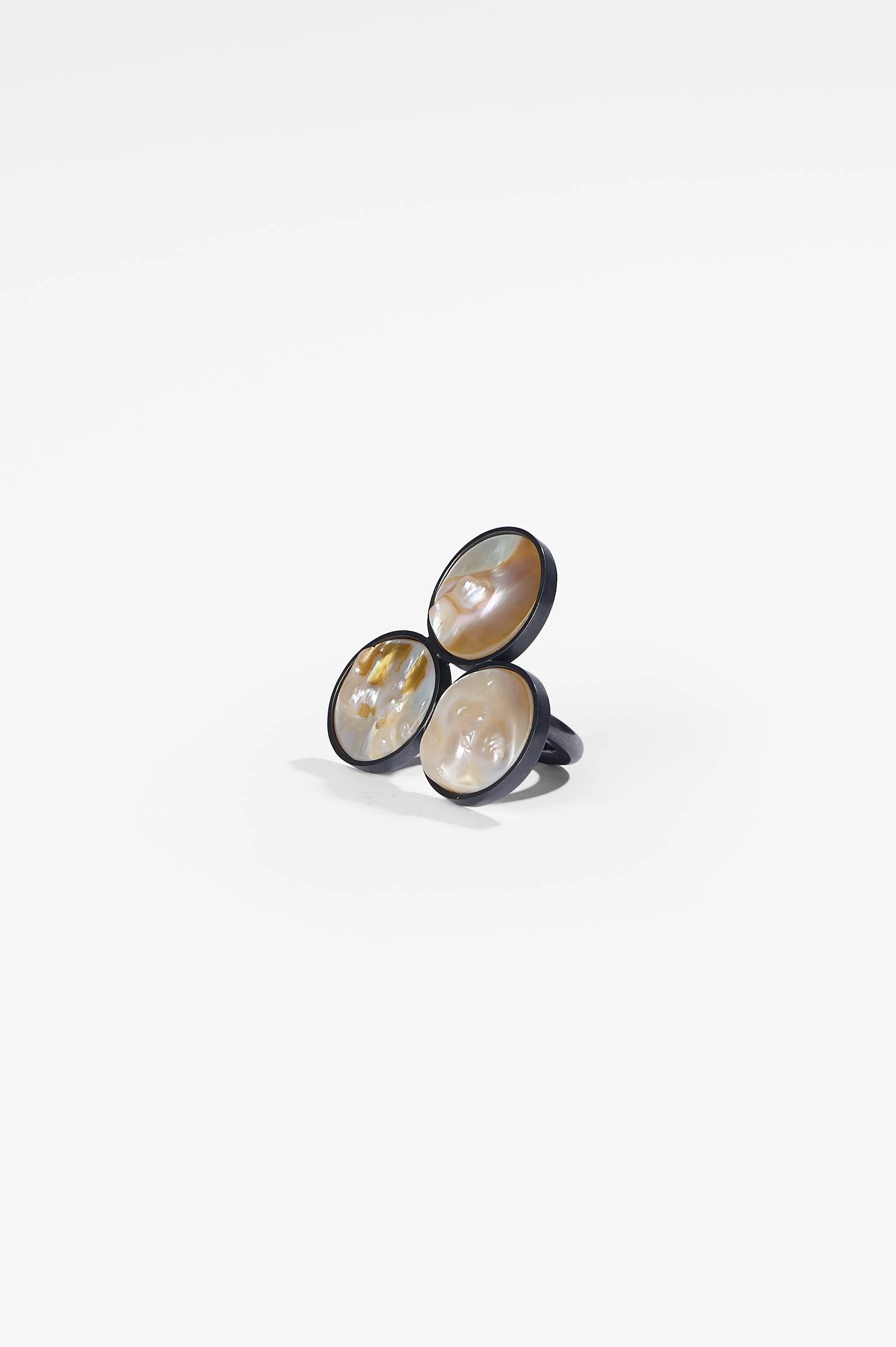 Laura Eyles, Untitled, oxidised sterling silver, mother of pearl, dimensions variable, 2026, $1,500. Photography: Ross Coulter