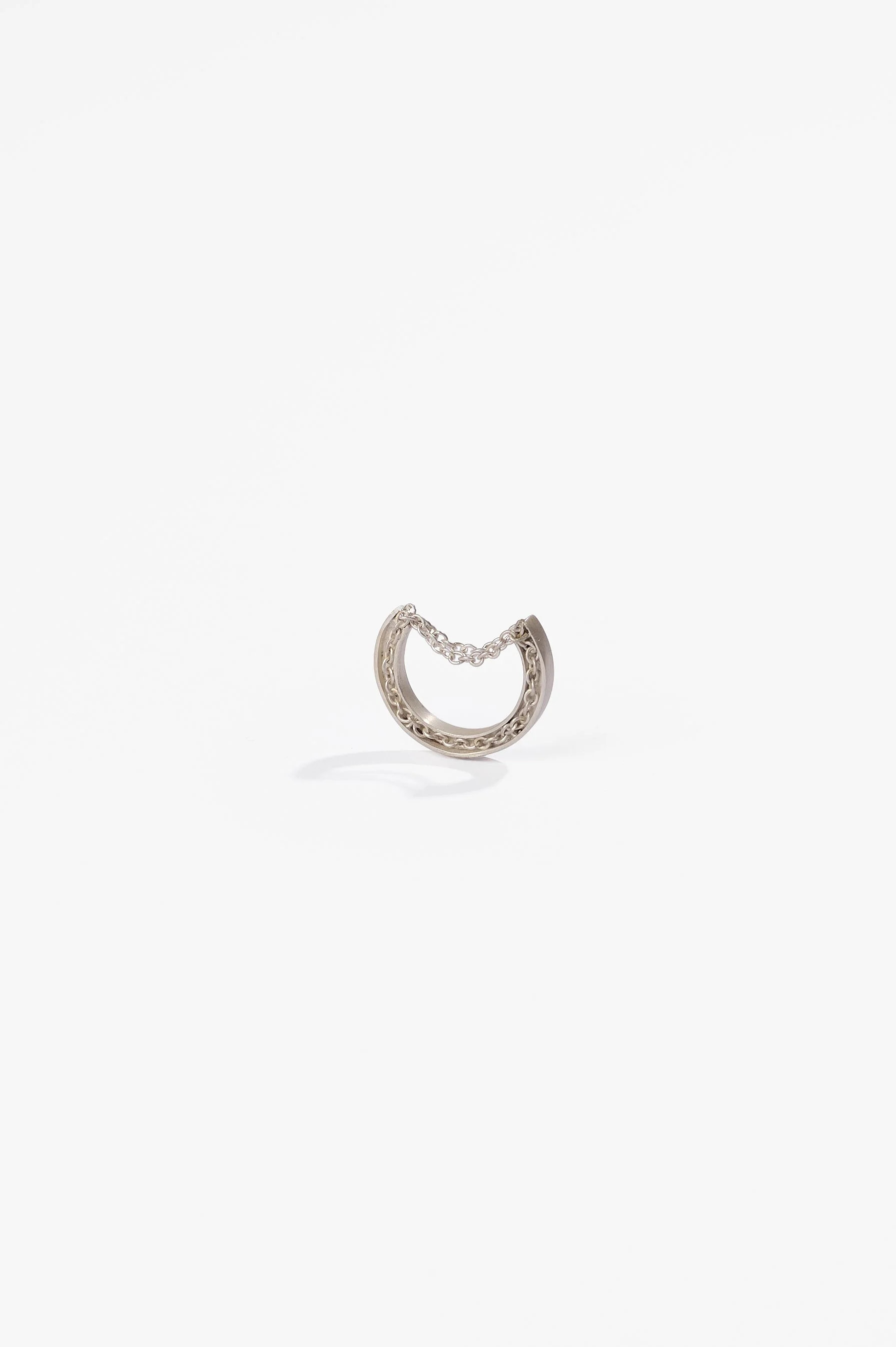 Katie Collins, Come what may, sterling silver, 2.5 x 4.4cm approx. size P, 2025. Photography: Ross Coulter.