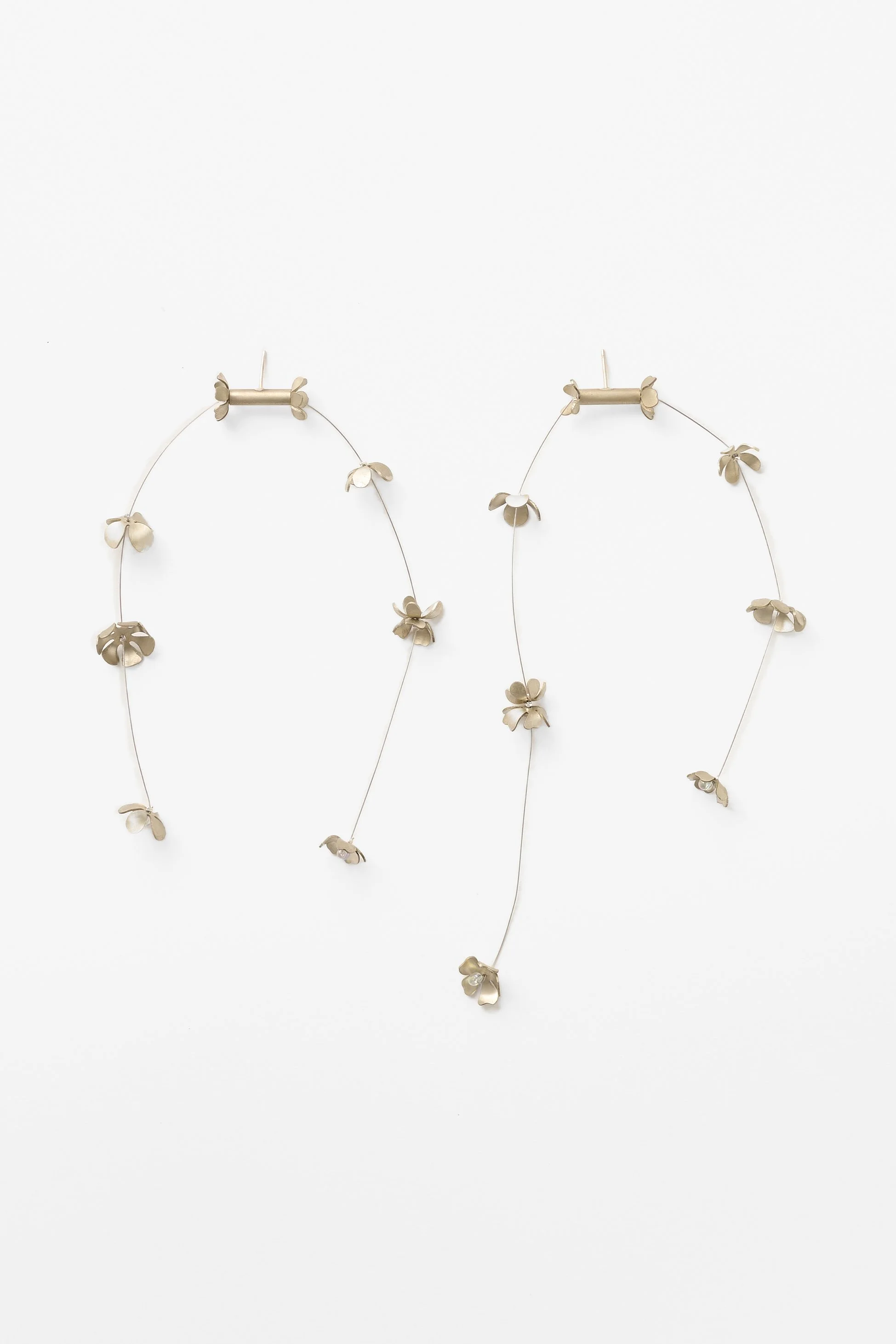 75. Elisa Zorraquin, ‘Las flores salen porque son curiosas I/II (Flowers bloom because they are curious)’, 2026, double strand flower earrings, nickel silver, sterling silver, stainless steel, glass beads, crimping wire, approx. each earring measures