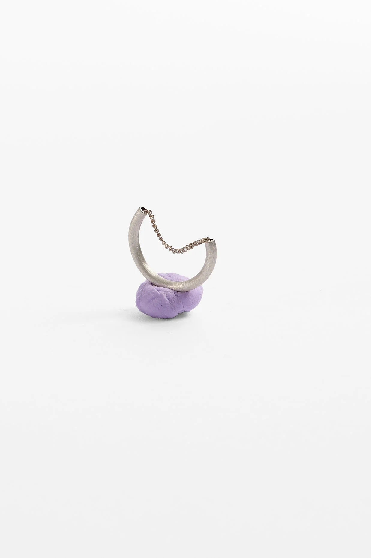 Katie Collins, What runs deep, sterling silver,
2.2 x .25cm, approx. size O, 2025. Photography: Ross Coulter.