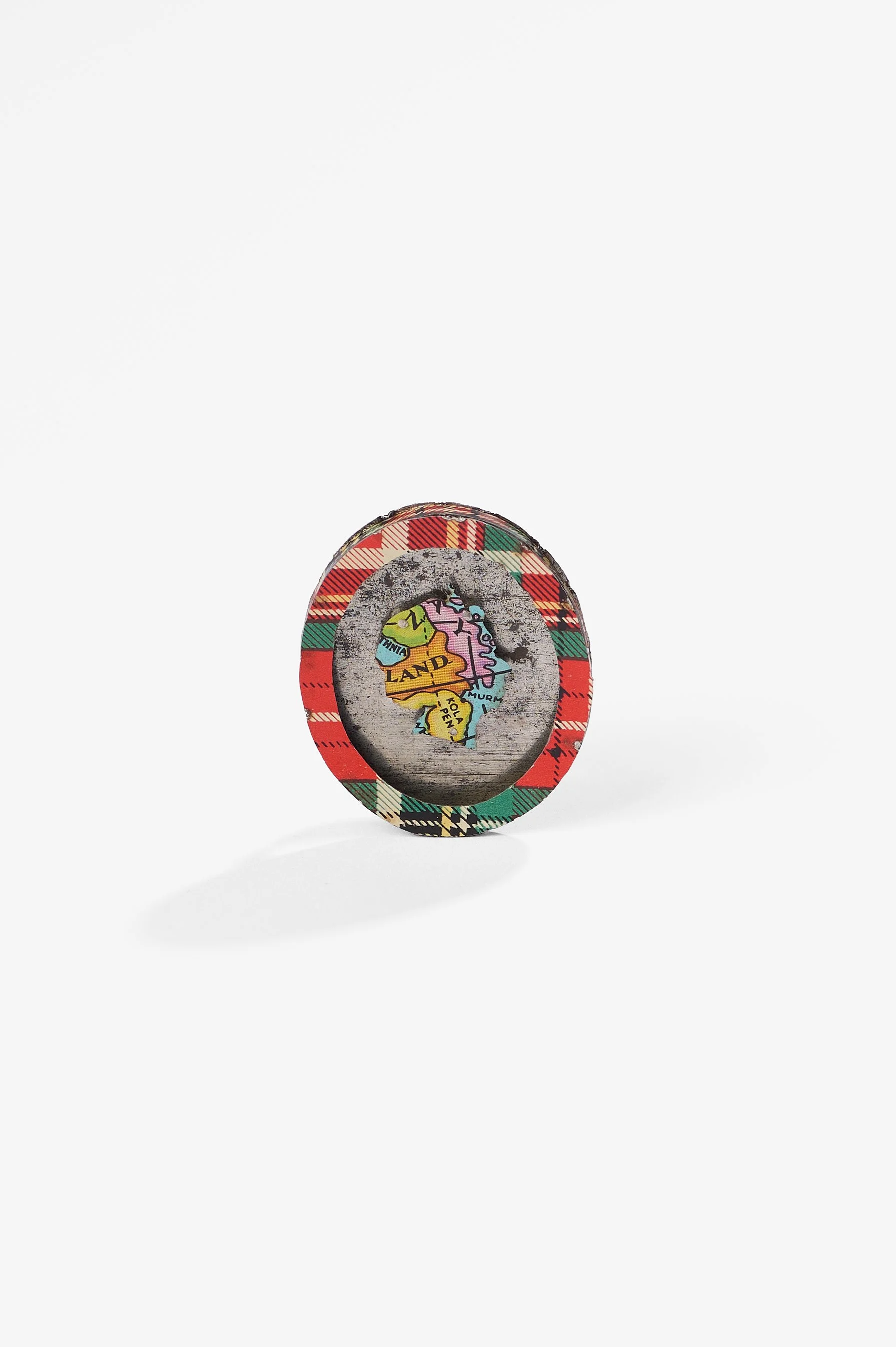 Anna Davern. 'Empire ring (Kola Peninsula)', biscuit tin, tin globe, 40x35x24mm, size 2026. $380. Photography: Ross Coulter