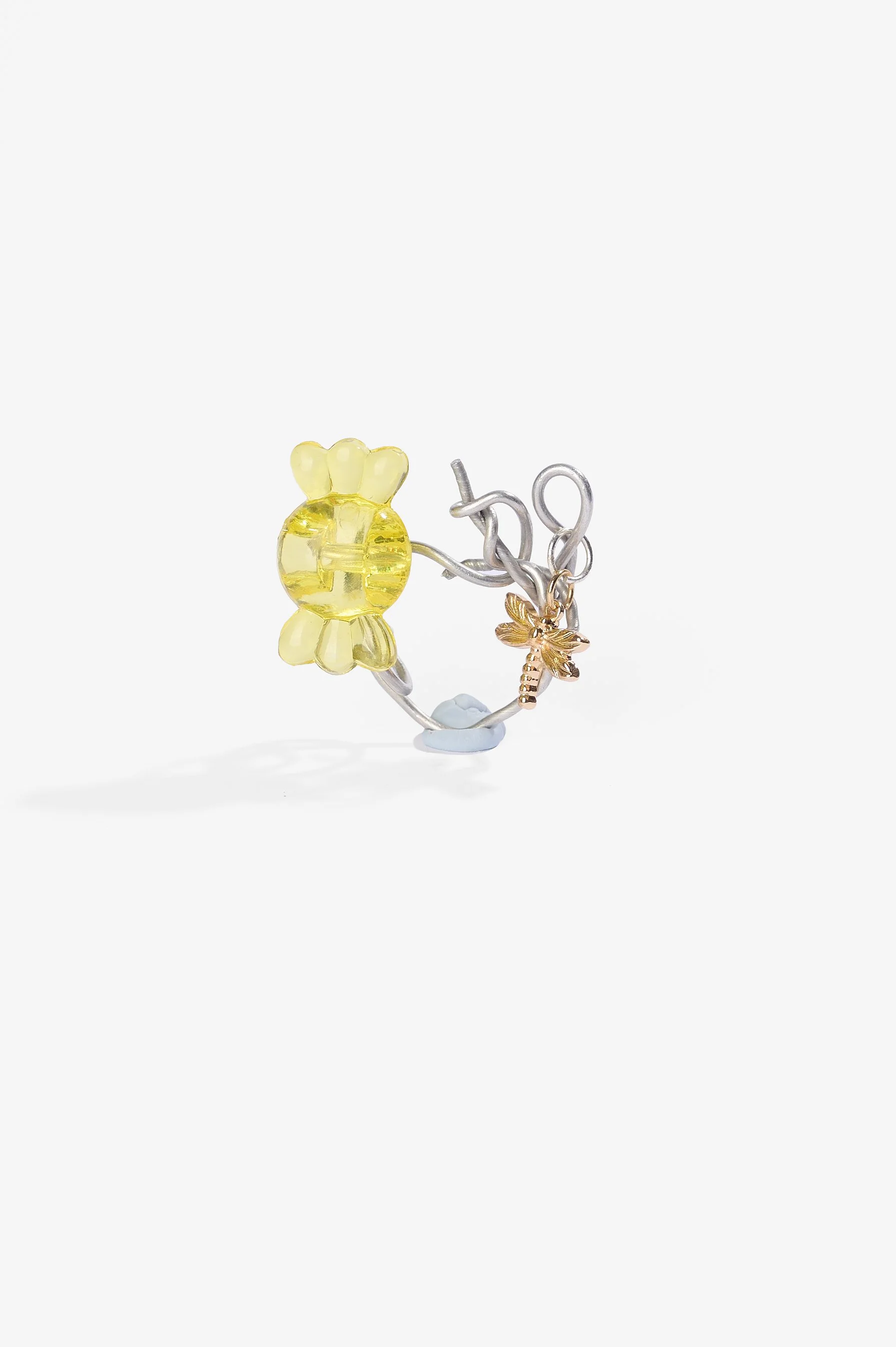 Roma Turnbull-Coulter, Yellow ring, sterling silver, aluminium wire, metal trinket, plastic beads, 2026, $75. Photography: Ross Coulter