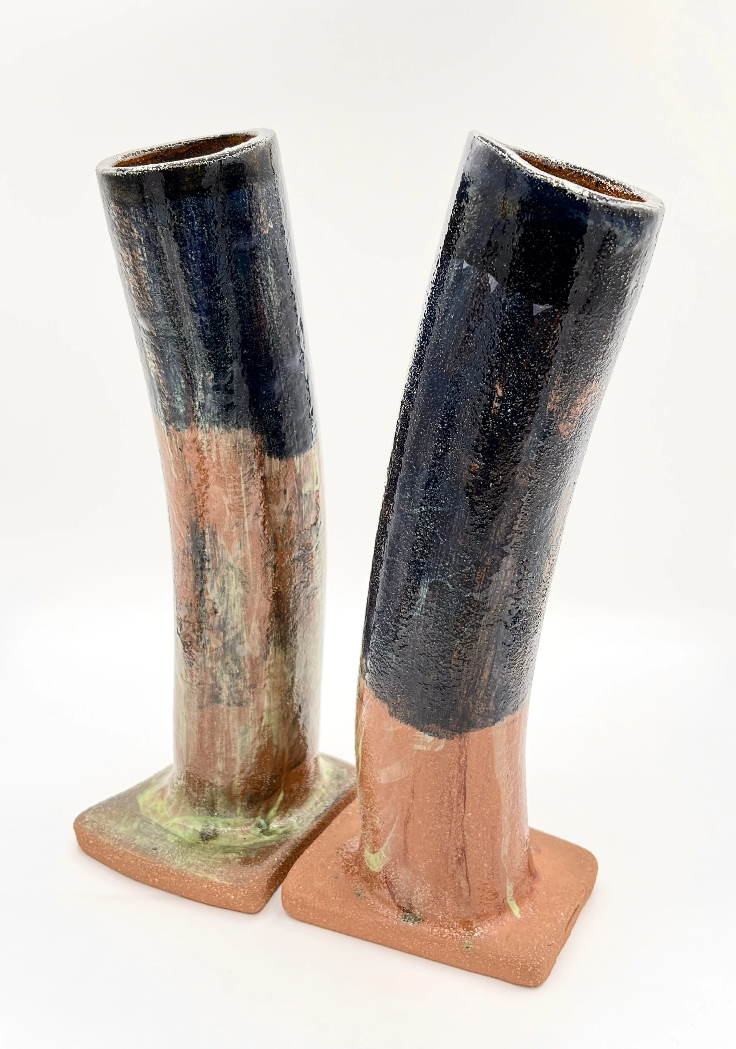 81. Benjamin Woods, ‘flutes with water mark’, 2025, terracotta, earthenware glaze, underglaze, 28x10x10cm each. Price: $800 pair.