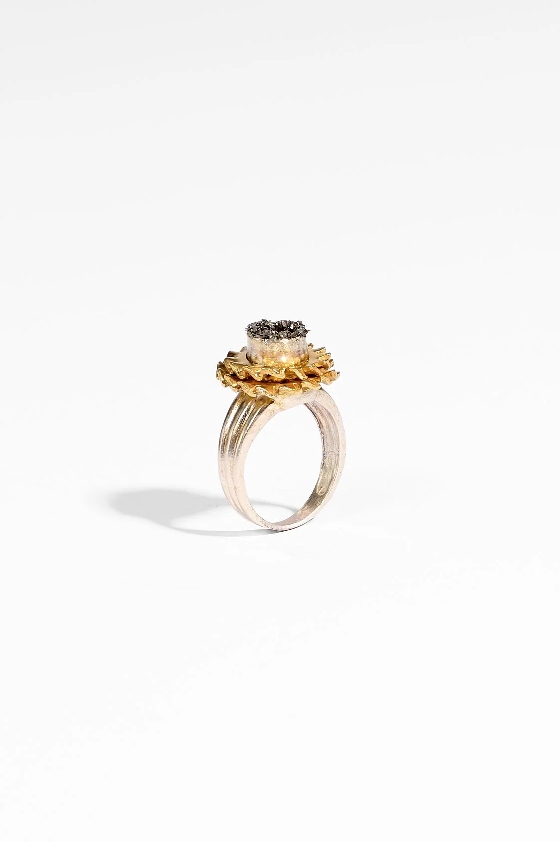 Laila Marie Costa, Untitled 18 (two stacked gold washers), sterling silver (gold plated) and black diamond powder, $1400. Photography: Ross Coulter