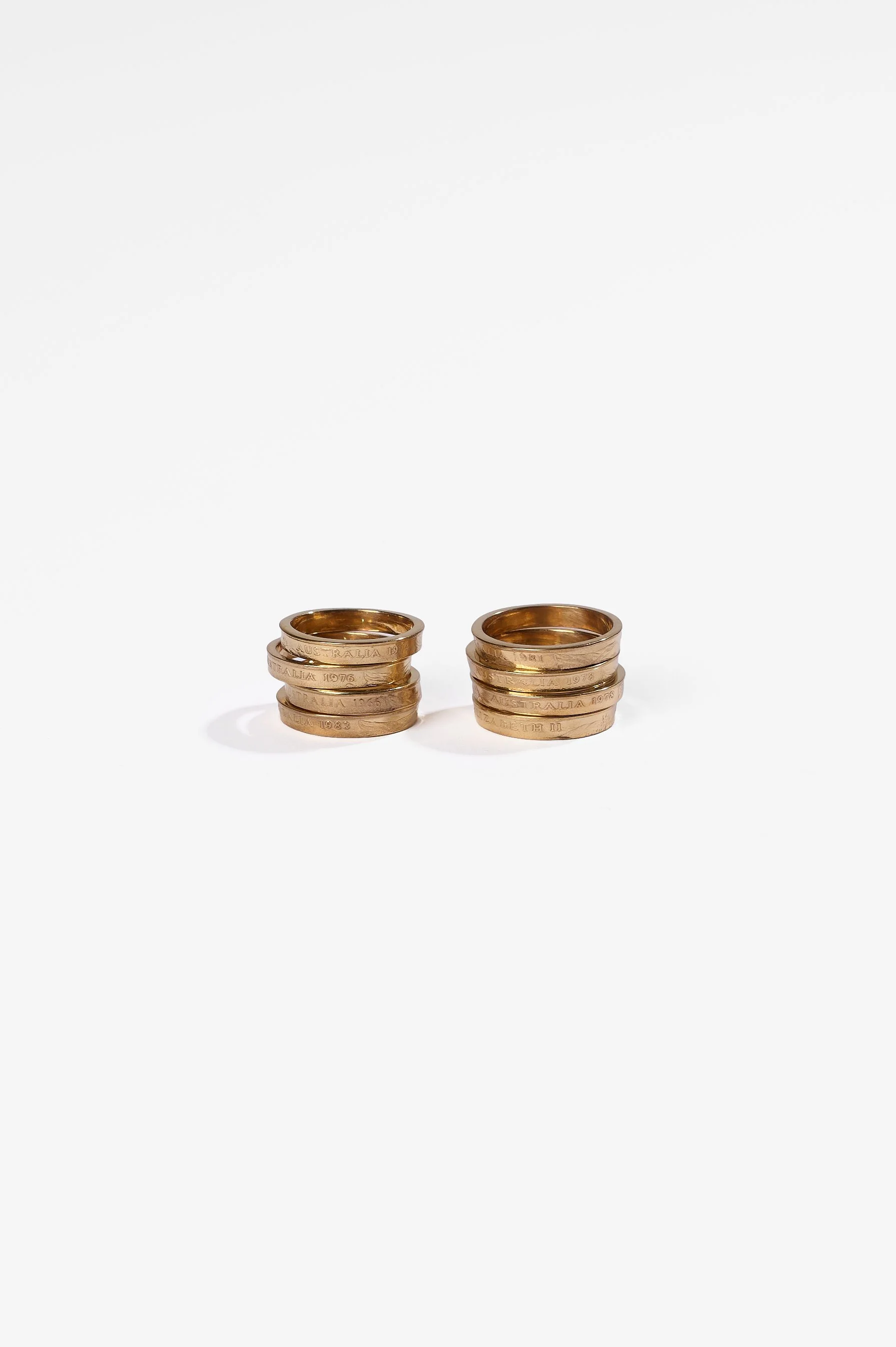 Sarah Ross, Recession rings 2.0, copper 2 cent coin, 24ct gold plate, various dates and sizes available, 2026, $290 each. Photography: Ross Coulter