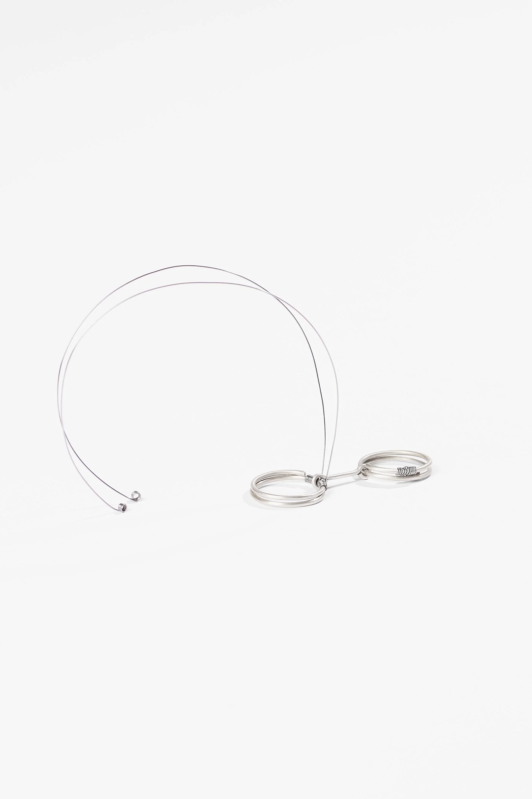 Nadia Cao-Alahananthan, Ơi (Uh-ee) Ring, sterling silver wire, binding wire, 10 x 1.9 x 6cm, 2026, $190 each. Photography: Ross Coulter