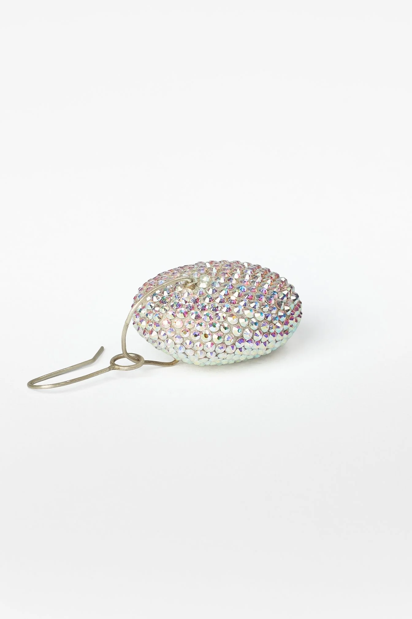 31. Raewyn Walsh, ‘single earring’, rhinestone earring (bright white), 2025, found pumice, preciosa crystals, sterling silver, 7x2x3cm. Price: $220. 