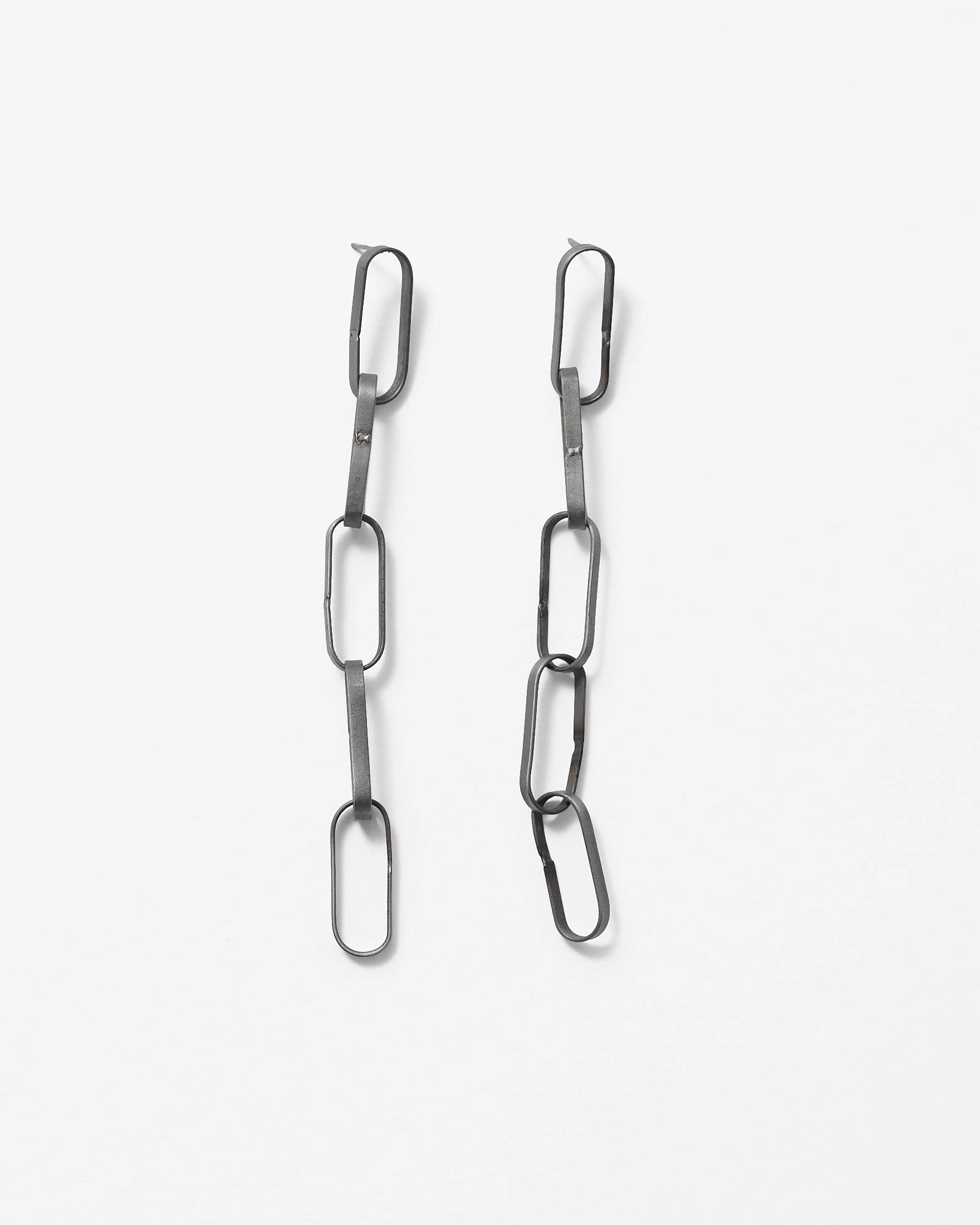 51. Melissa Cameron, ‘Sweeper Blade 5 link earrings’, 2025, found steel street sweeper blades, stainless steel posts, waxed brushed finish, each earring measures: 3x2x1cm. Price: $280